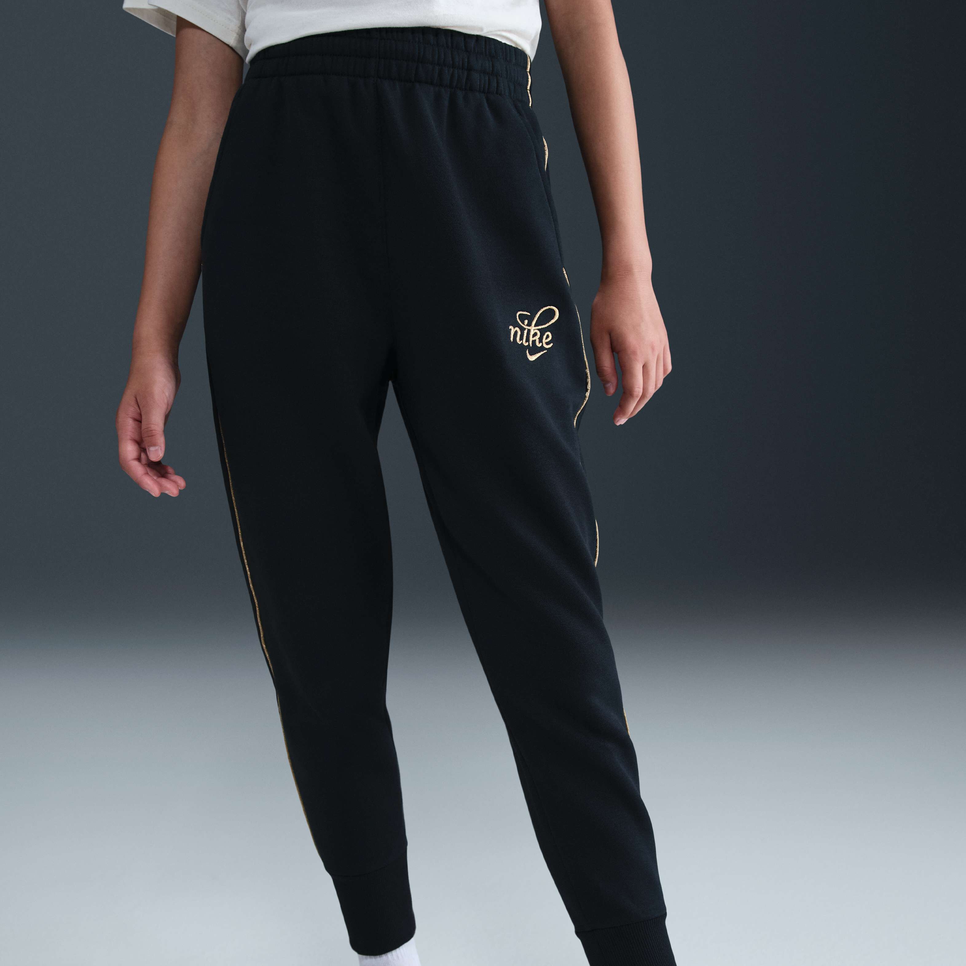 nike sweatpants black and gold