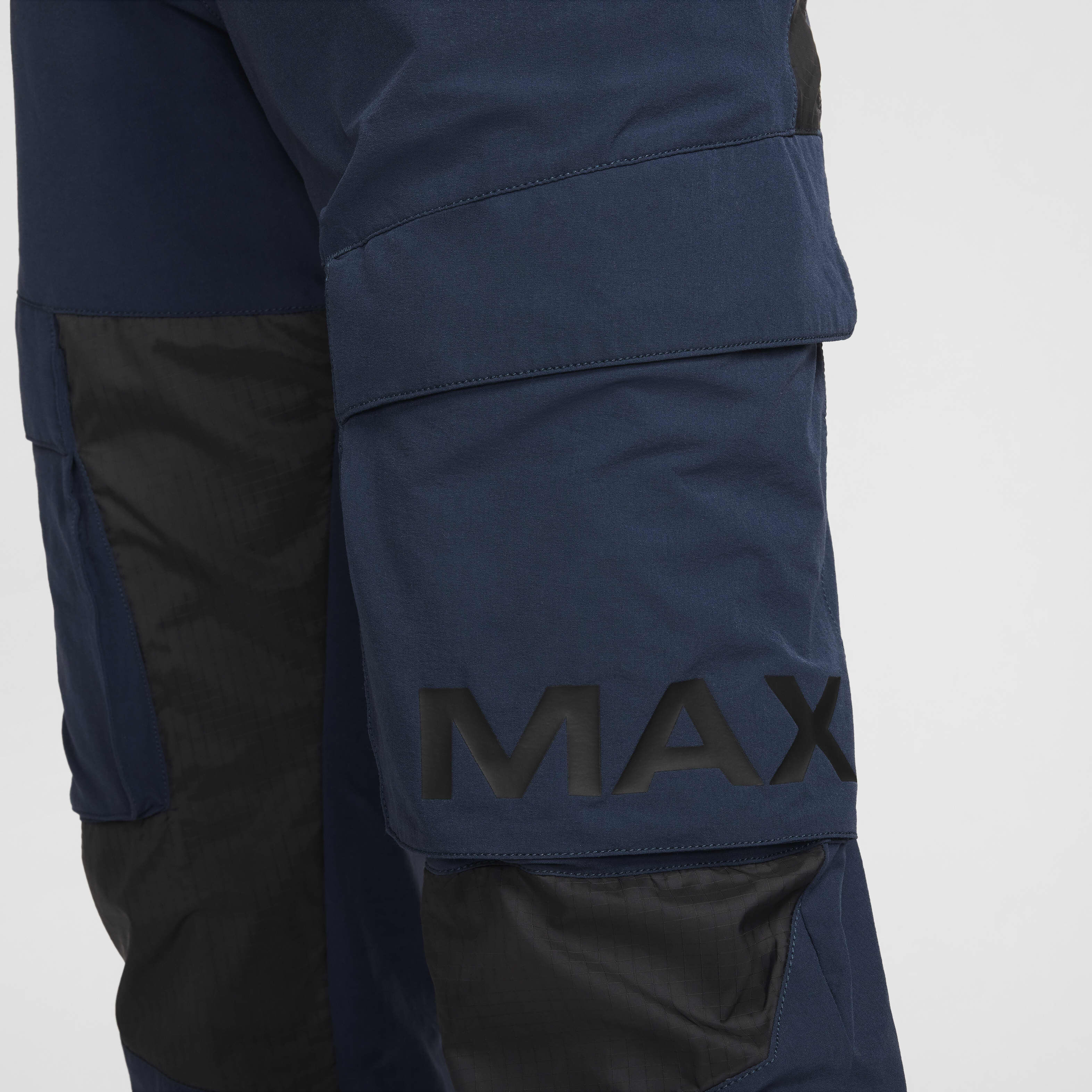 Buy Nike Sportswear Air Max Men s Woven Cargo Trousers Armoury Navy Dark Smoke Grey Black Nike Kuwait Official