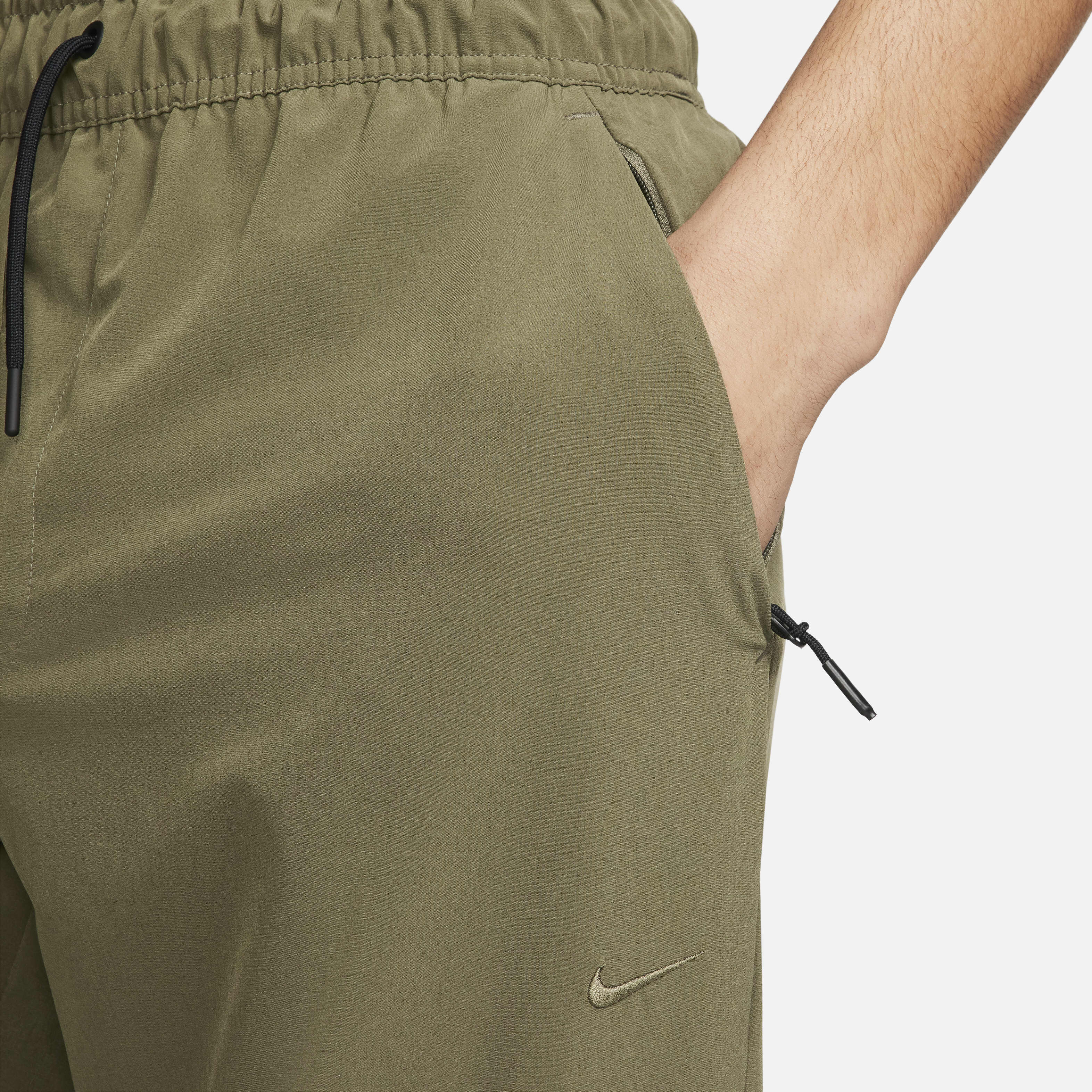 Buy Nike Unlimited Men s Dri FIT Zip Cuff Versatile Trousers Nike Kuwait Official