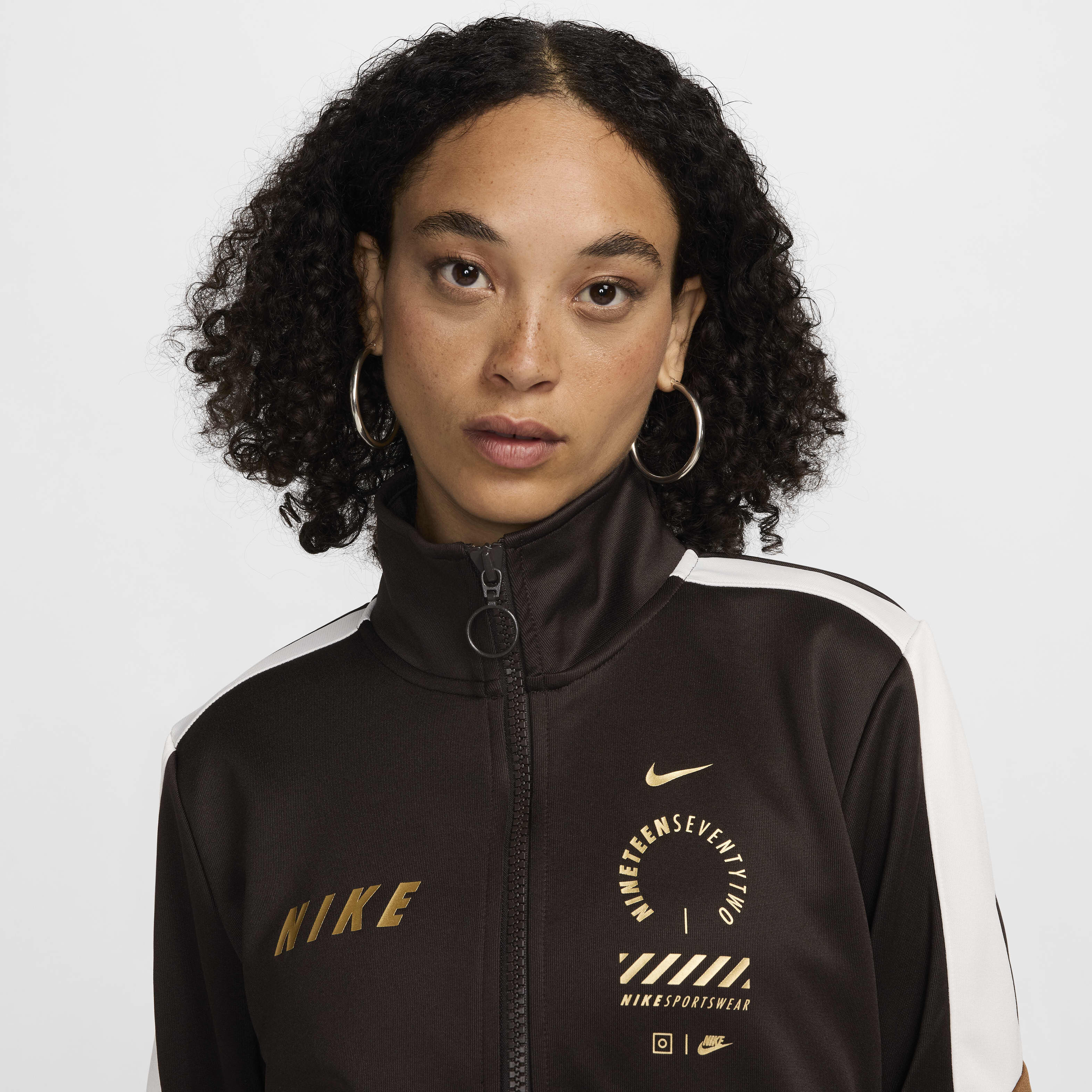 Nike tracksuit womens black and gold on sale
