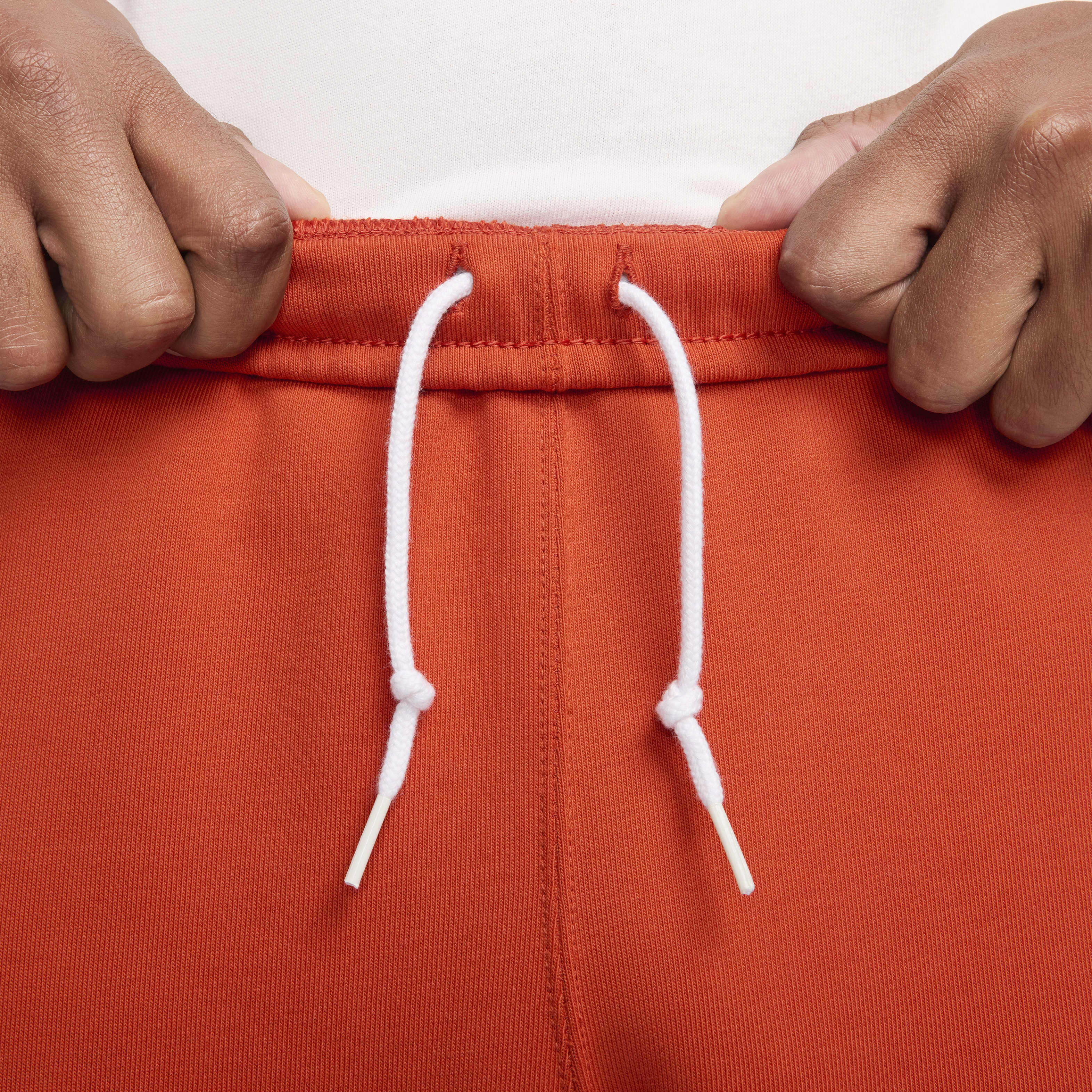 Buy Nike Solo Swoosh Men's Fleece Trousers - Dragon Red/White | Nike Kuwait  Official