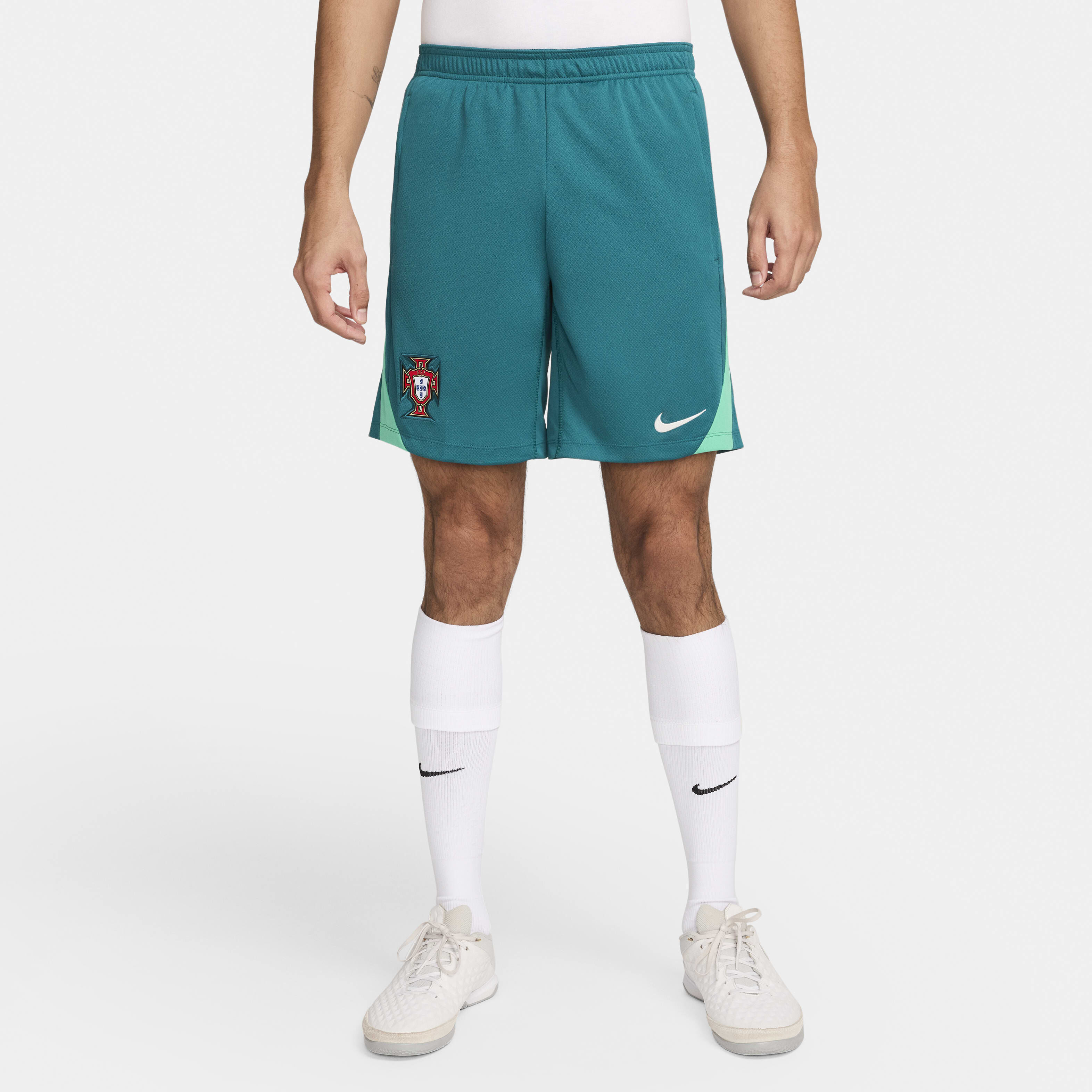 nike green football shorts