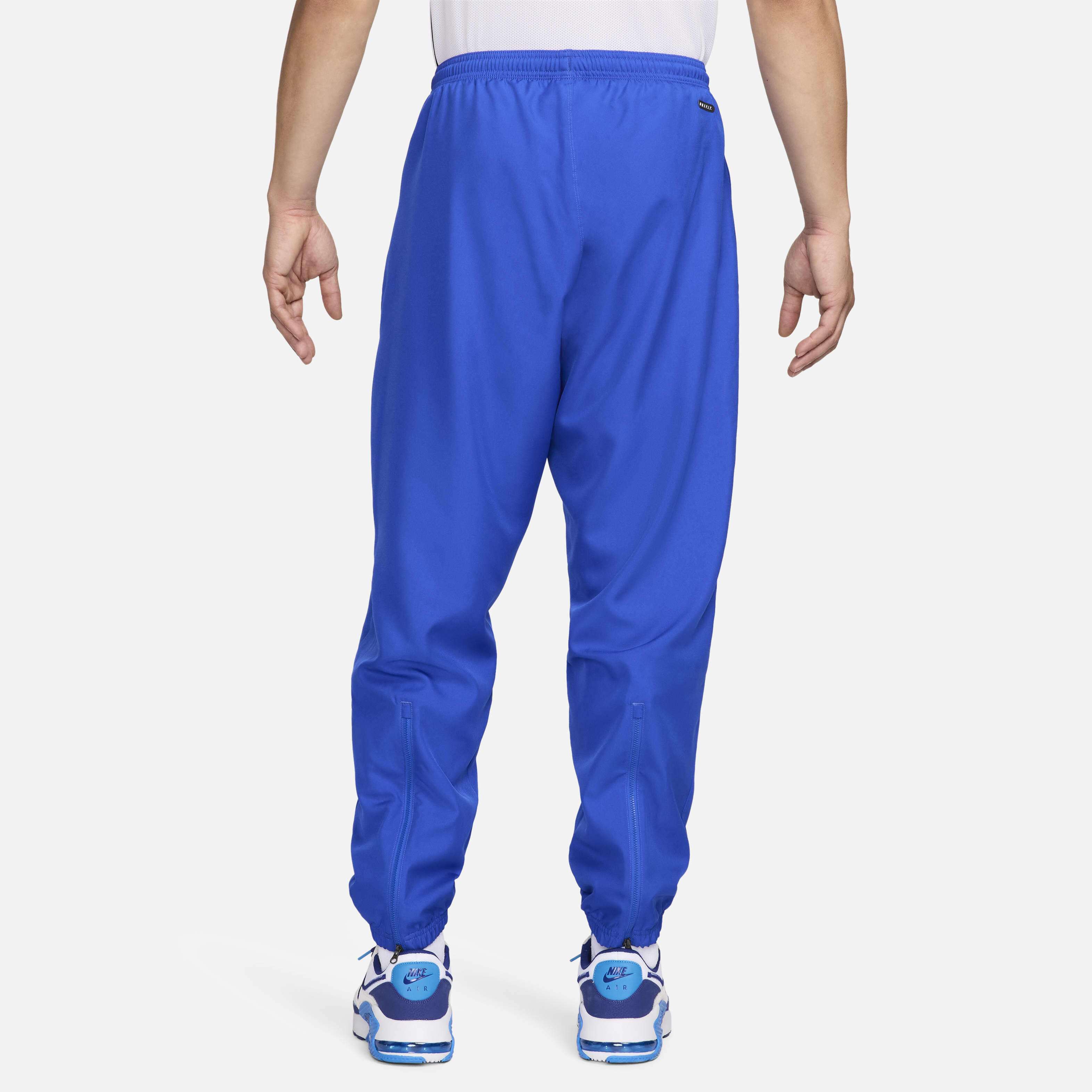 Nike guppy track pants online