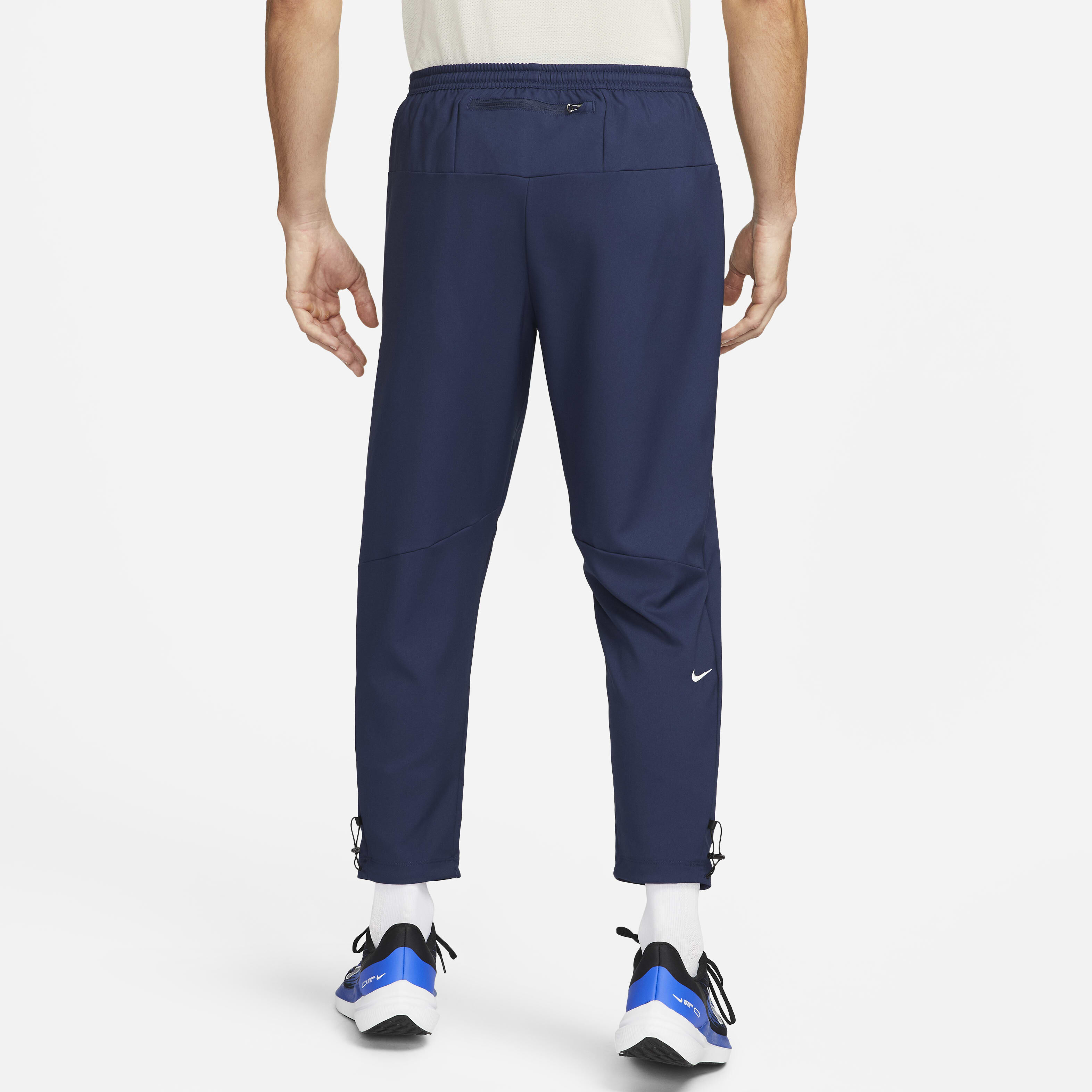 Buy Nike Challenger Track Club Men s Dri FIT Running Trousers Midnight Navy Summit White Summit White Nike Kuwait Official