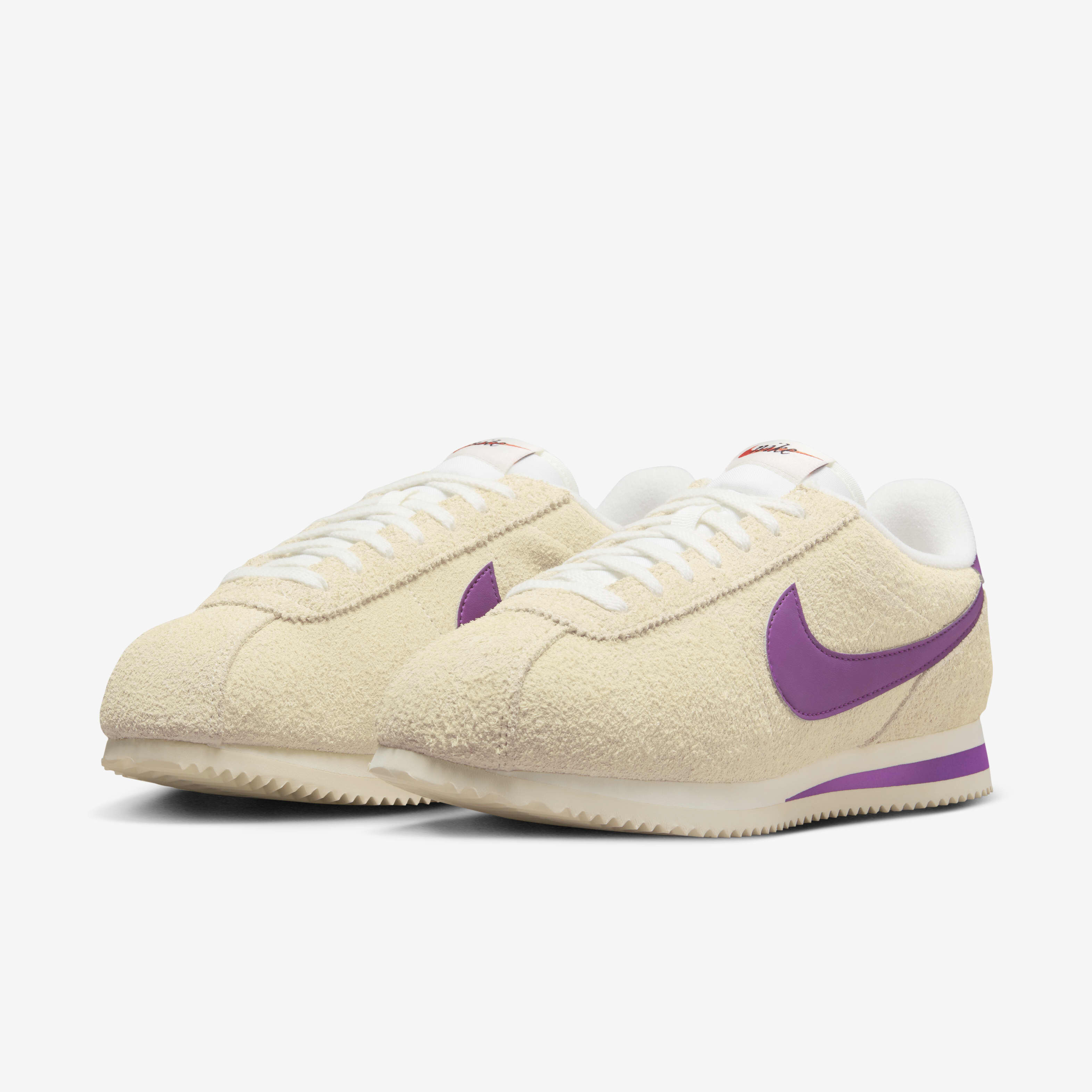 Pink suede nike cortez deals