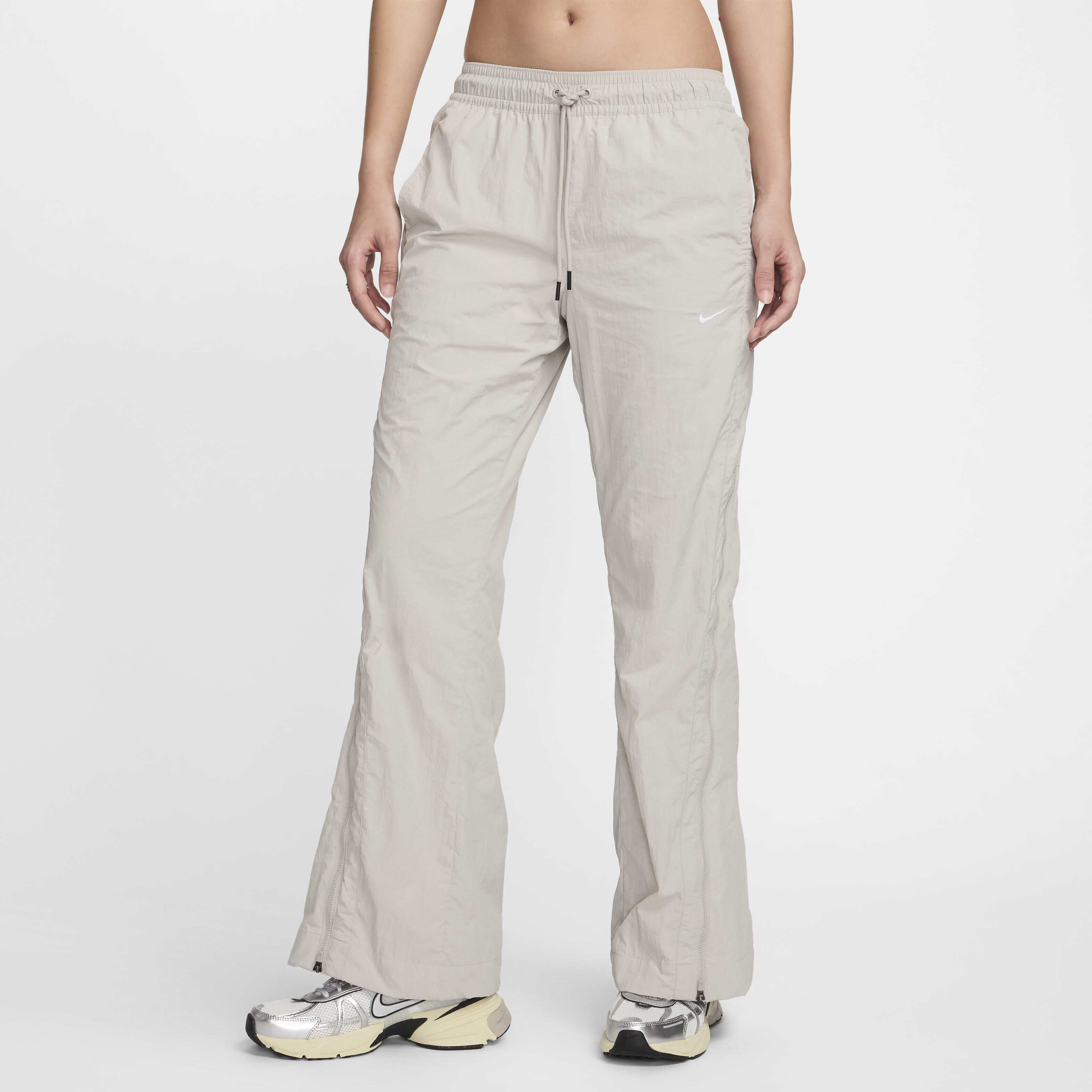 Buy Nike Sportswear Collection Women s Mid Rise Repel Zip Trousers Nike Kuwait Official
