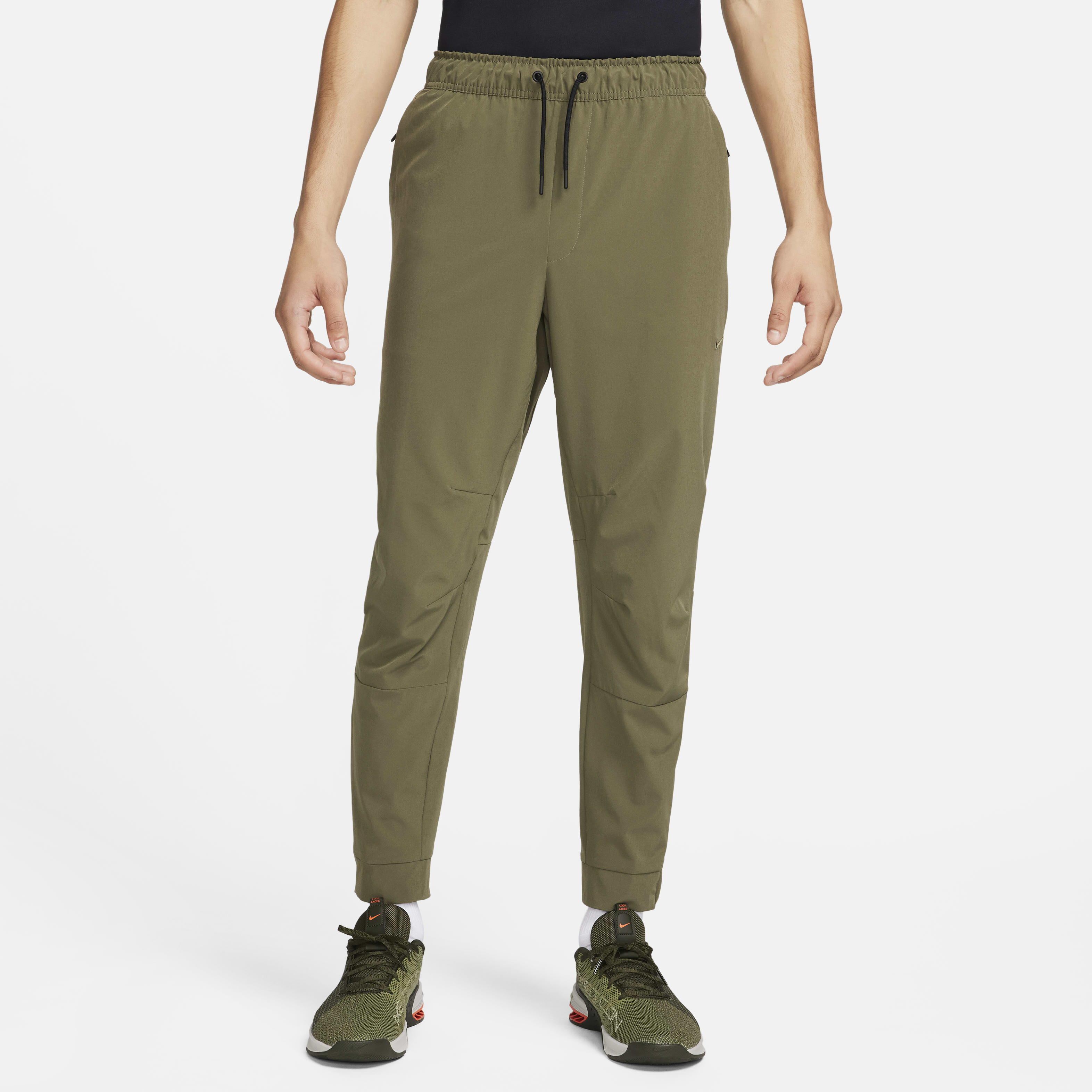 Buy Nike Unlimited Men s Dri FIT Zip Cuff Versatile Trousers Medium Olive Black Medium Olive Nike Kuwait Official