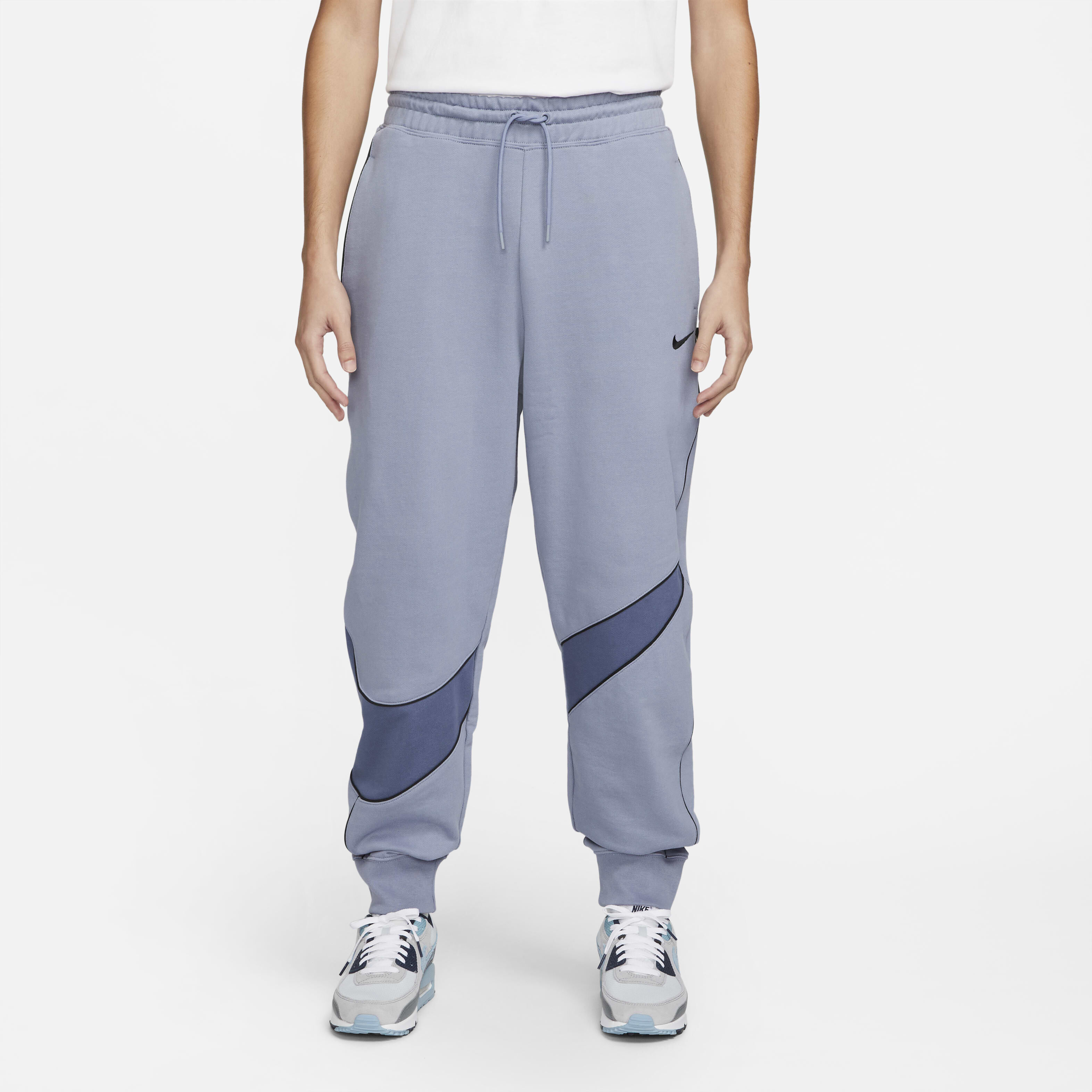 Nike swoosh trousers online
