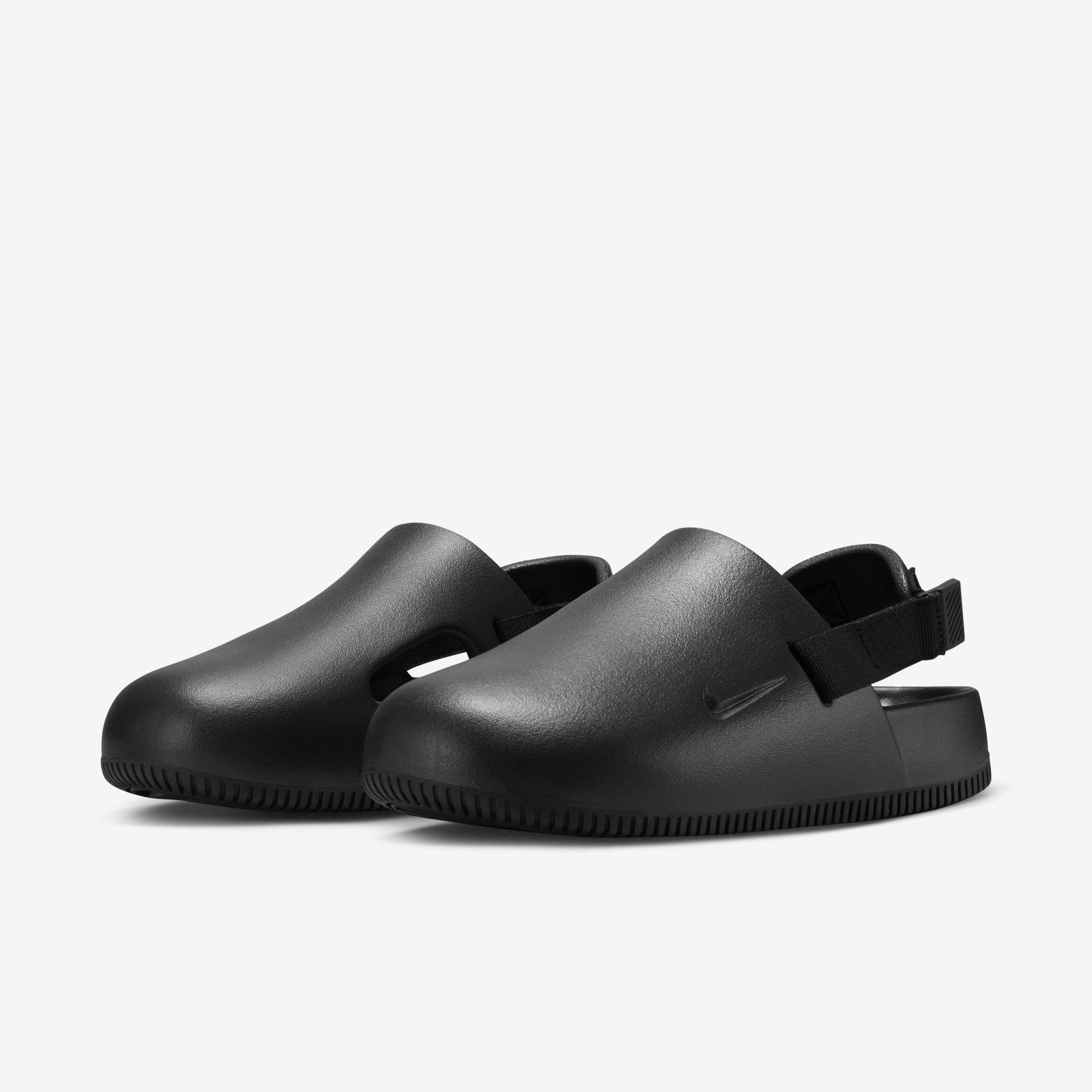 Buy Nike Calm Women s Mules Black Black Nike Kuwait Official