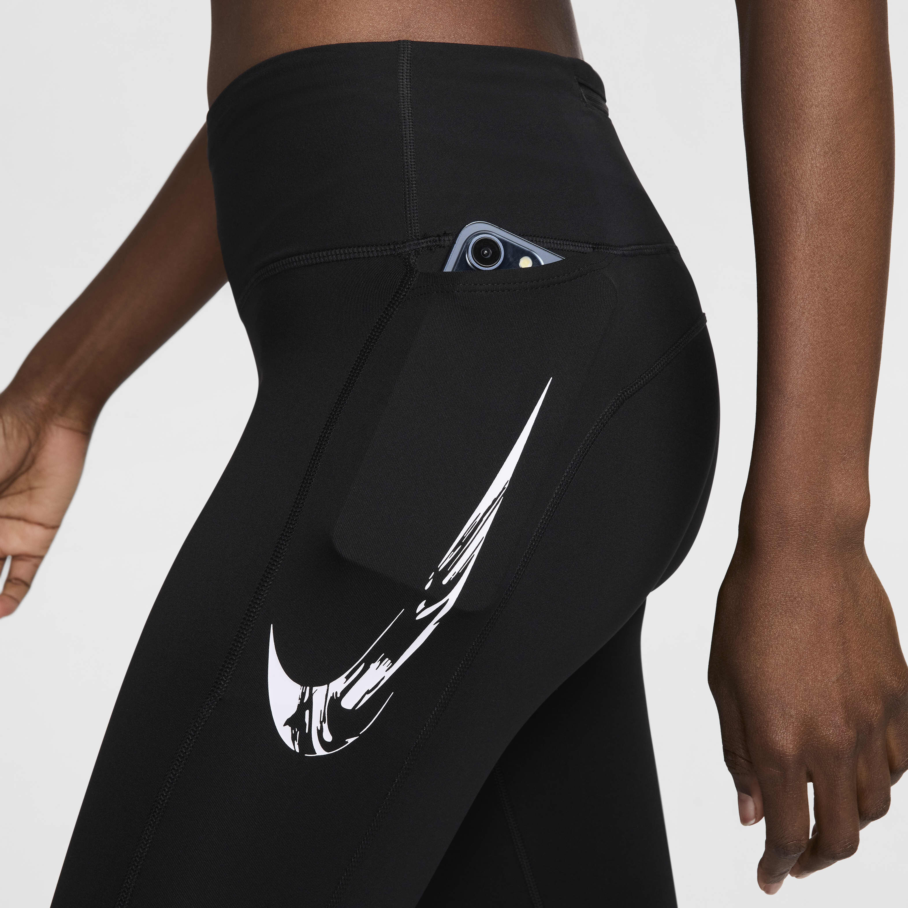 Buy Nike Fast Women s Mid Rise 7 8 Running Leggings with Pockets Black White Nike Kuwait Official
