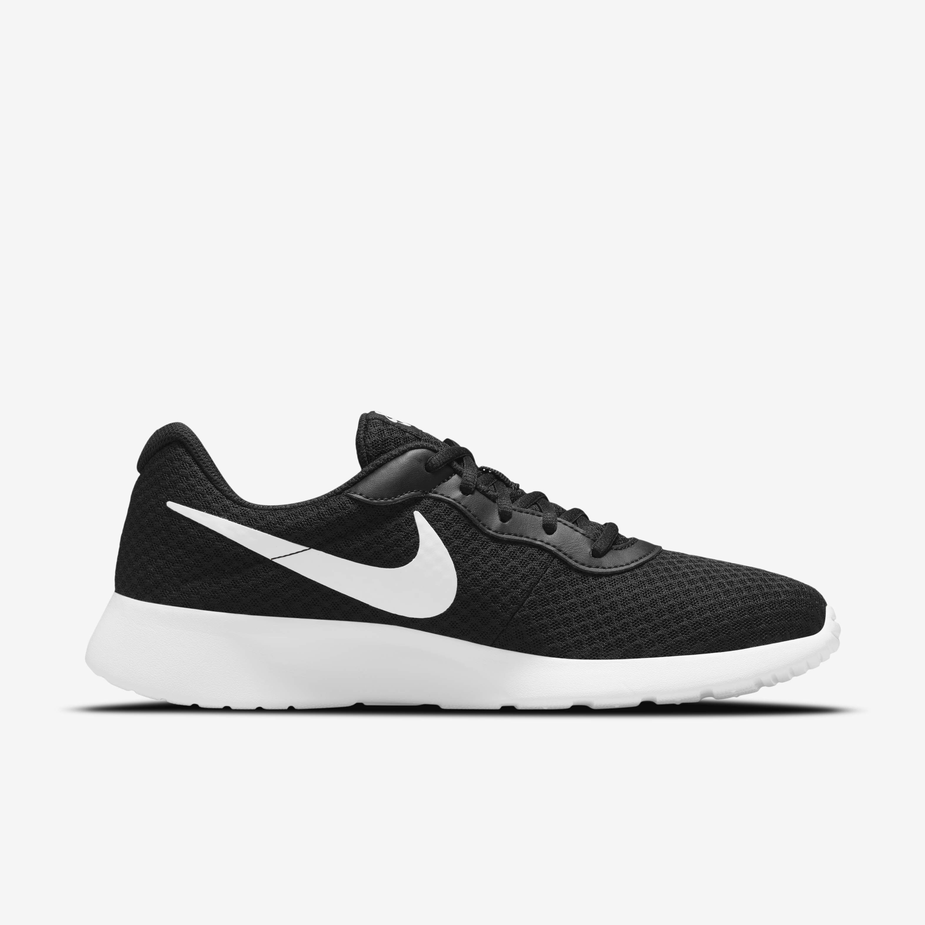 Nike tanjun mens black and gold on sale