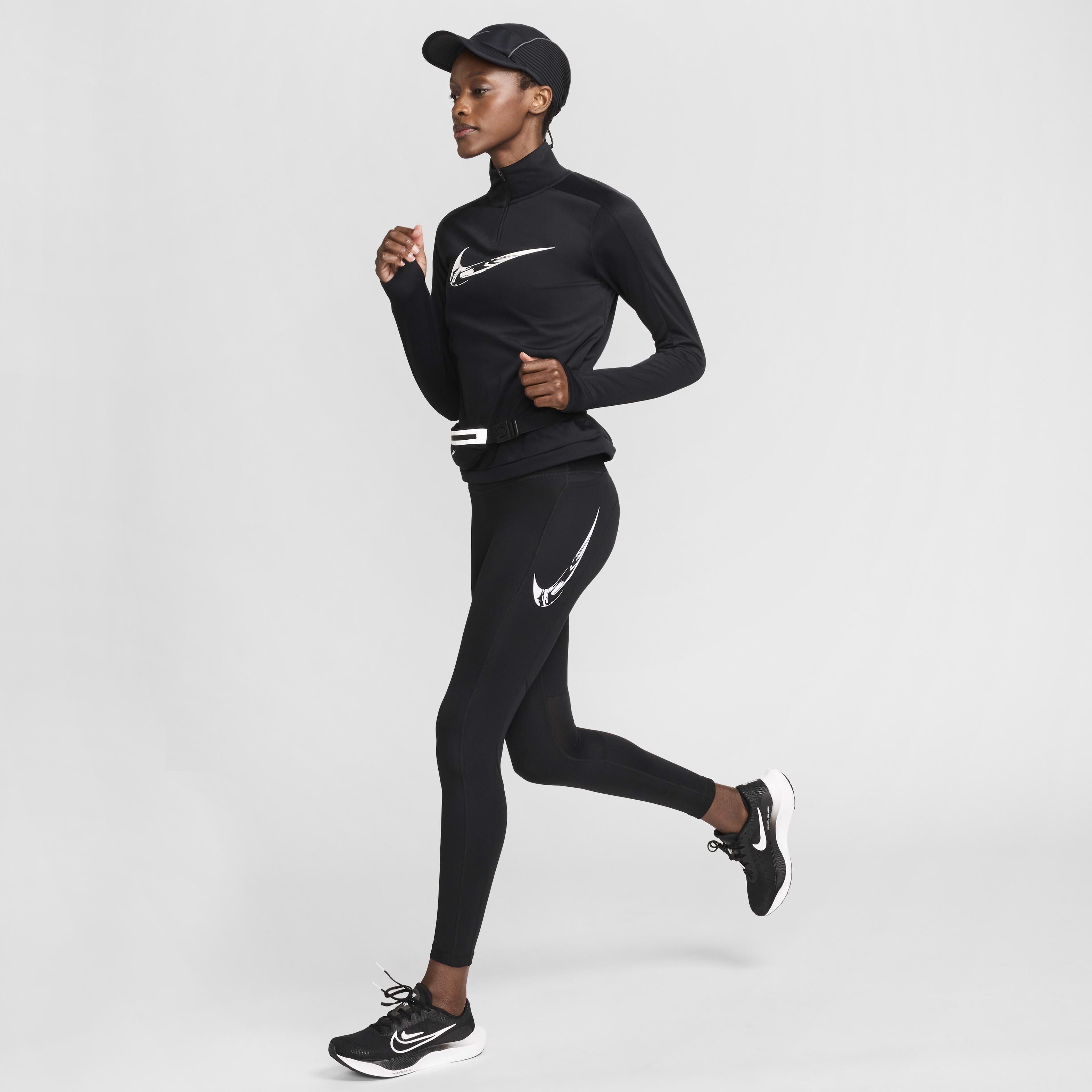 Buy Nike Fast Women s Mid Rise 7 8 Running Leggings with Pockets Black White Nike Kuwait Official