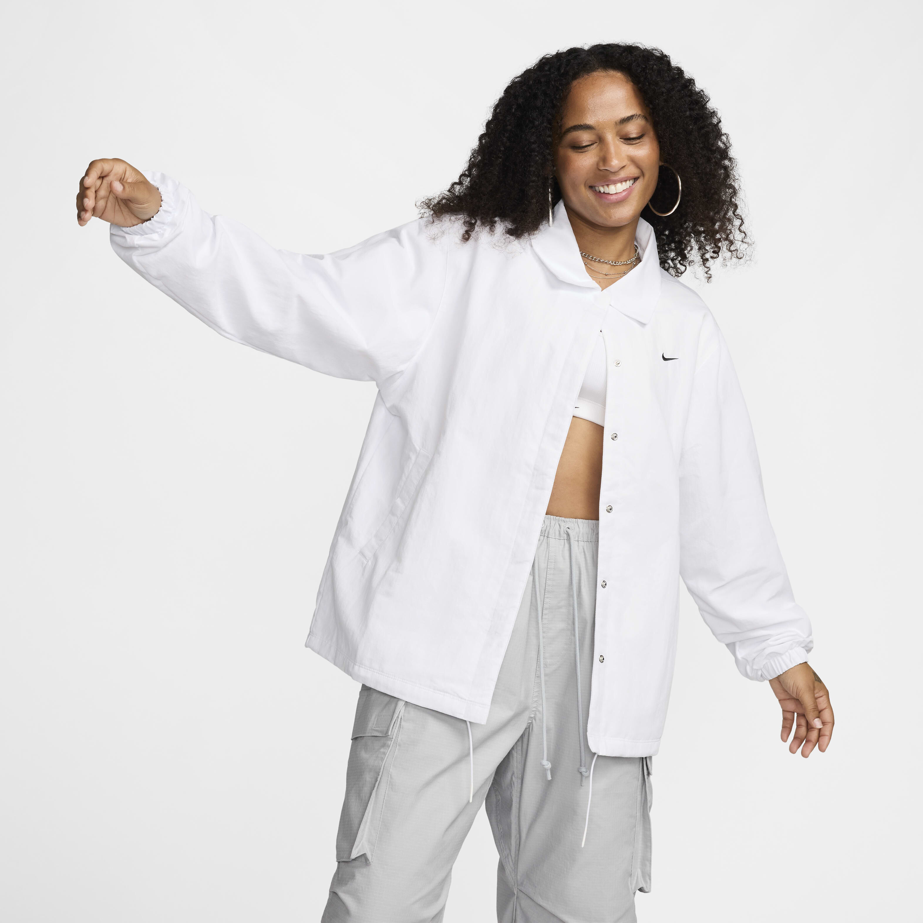 Buy Nike Sportswear Essential Women s Oversized UV Woven Coaches Jacket Nike Kuwait Official