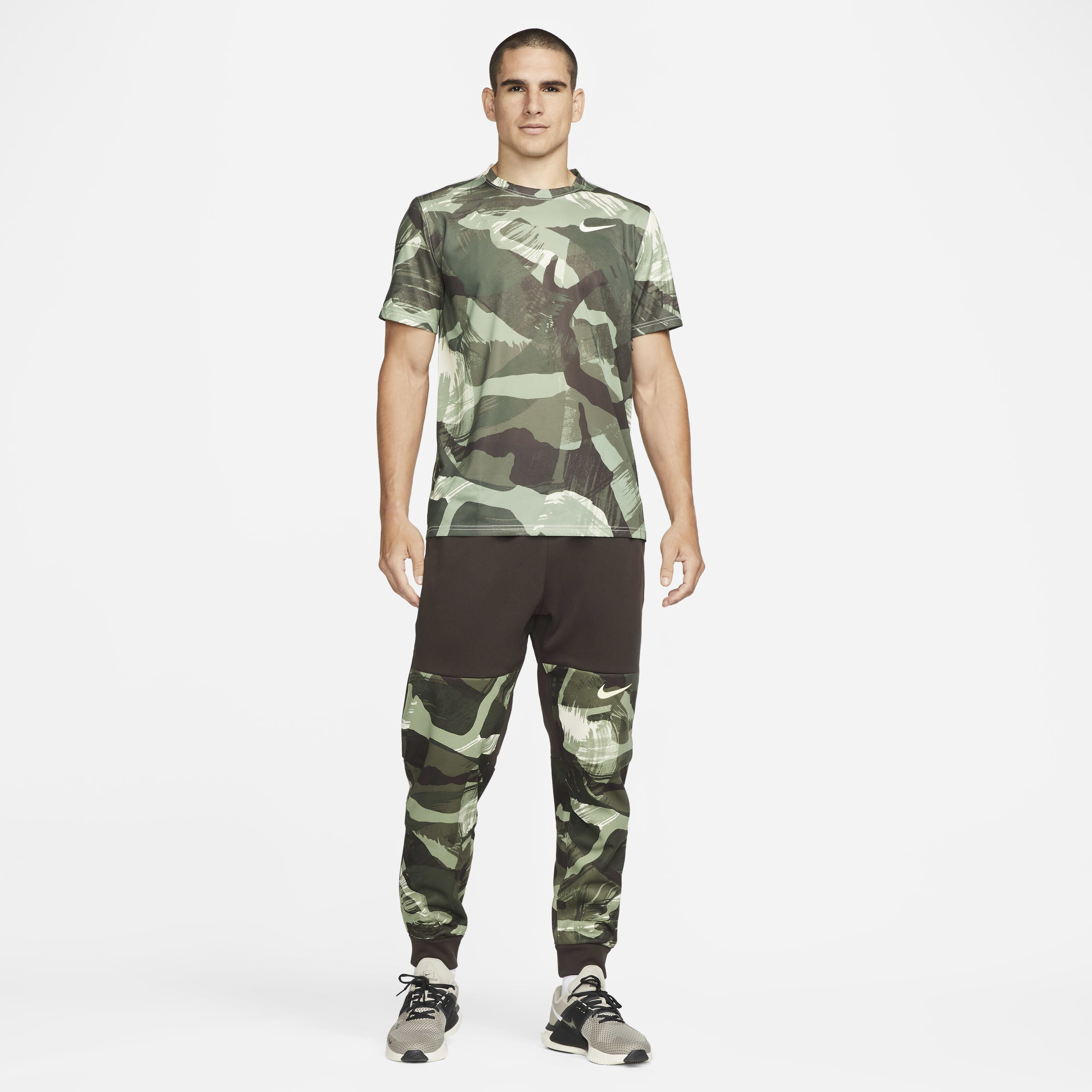 Buy Nike Therma FIT Men s Camo Tapered Training Trousers Velvet Brown Coconut Milk Nike Kuwait Official
