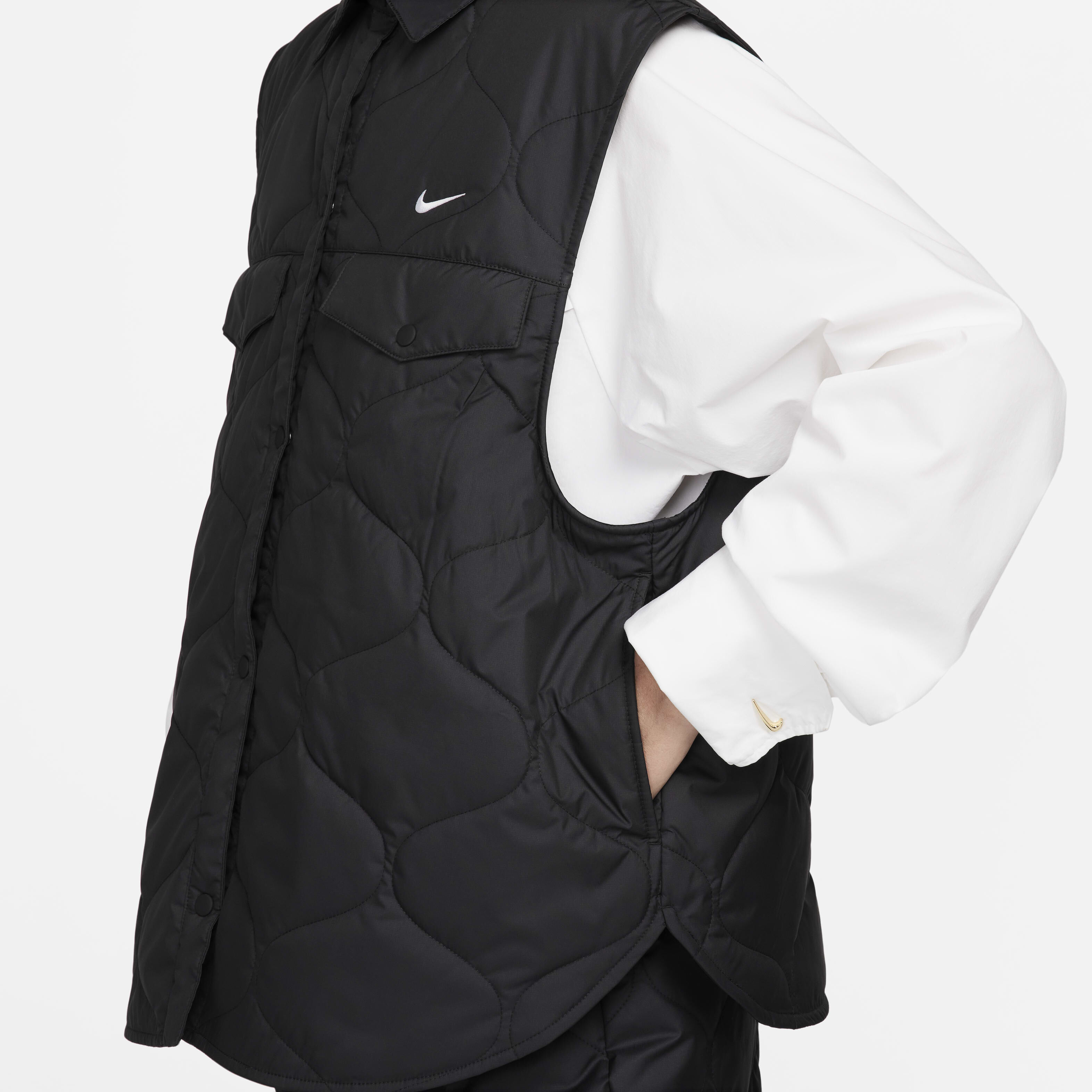 Nike essential filled vest online