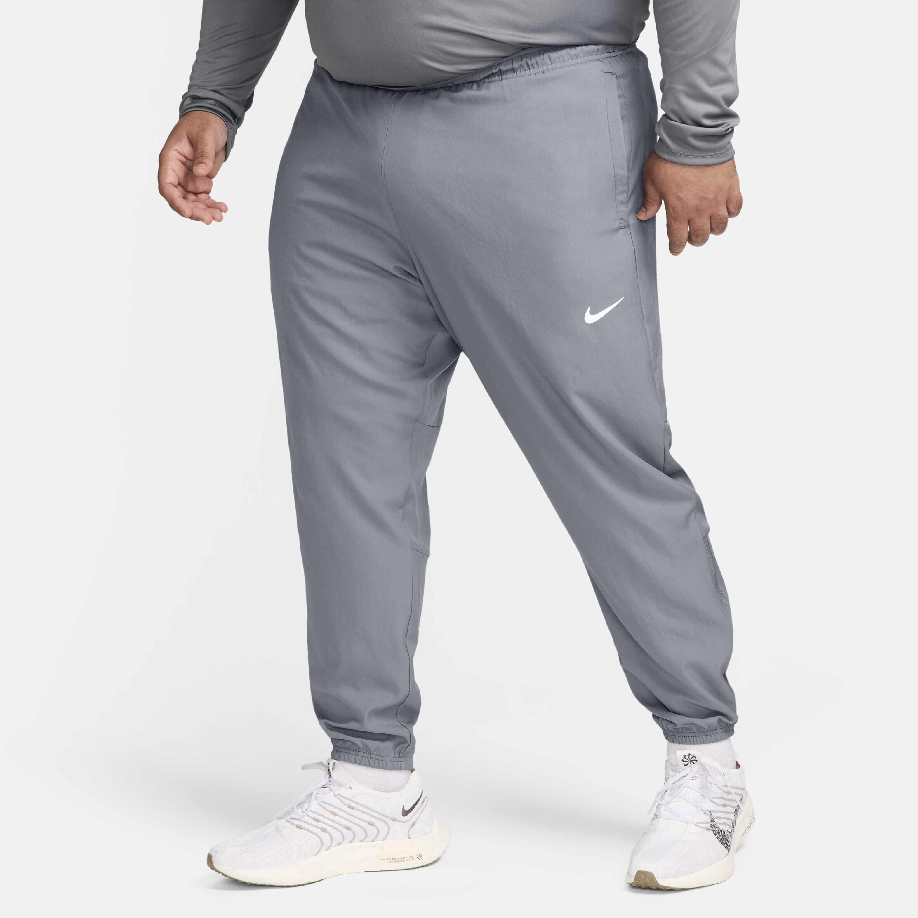 Buy Nike Challenger Men s Dri FIT Woven Running Trousers Nike Kuwait Official