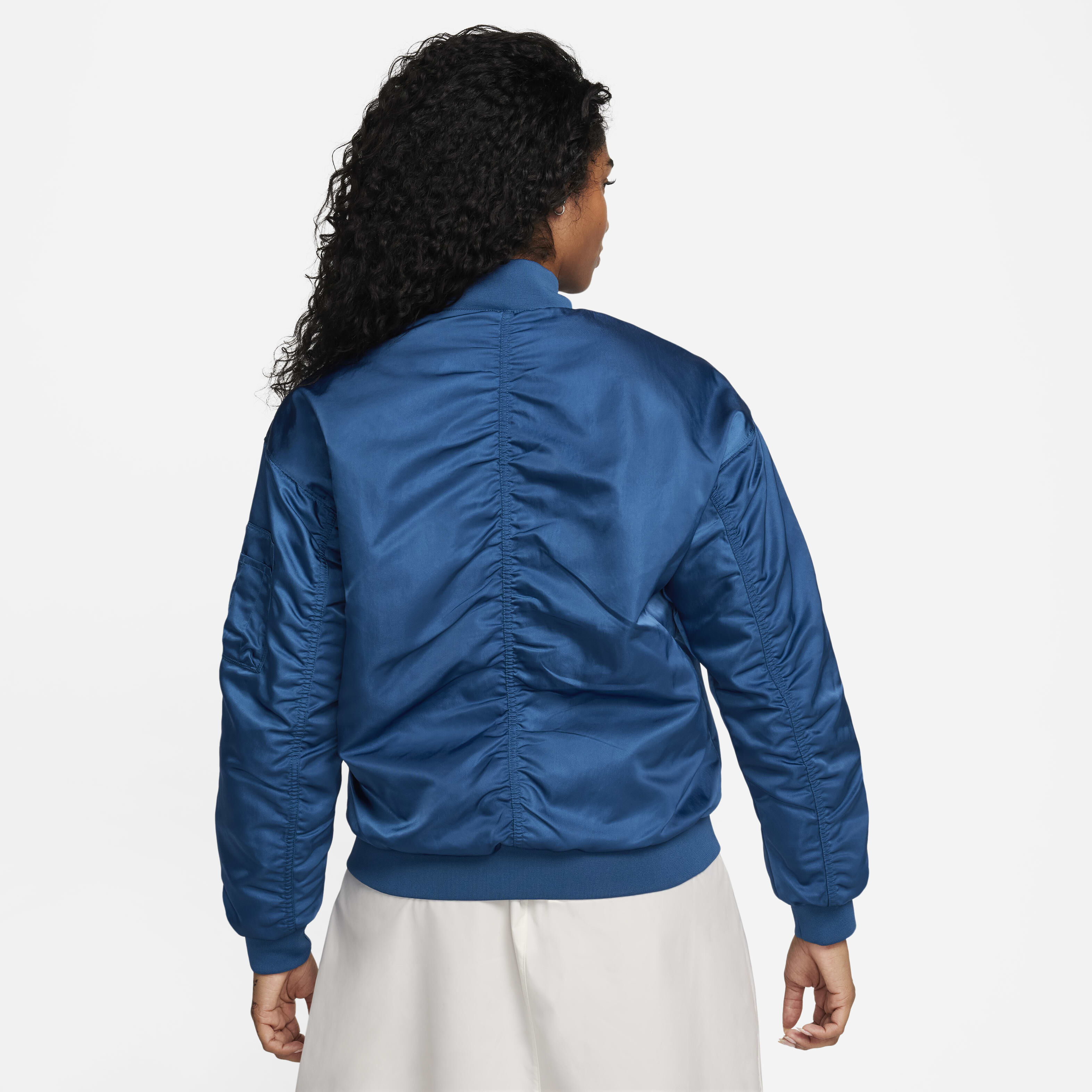Buy Nike Sportswear Women s Reversible Varsity Bomber Jacket Nike Kuwait Official