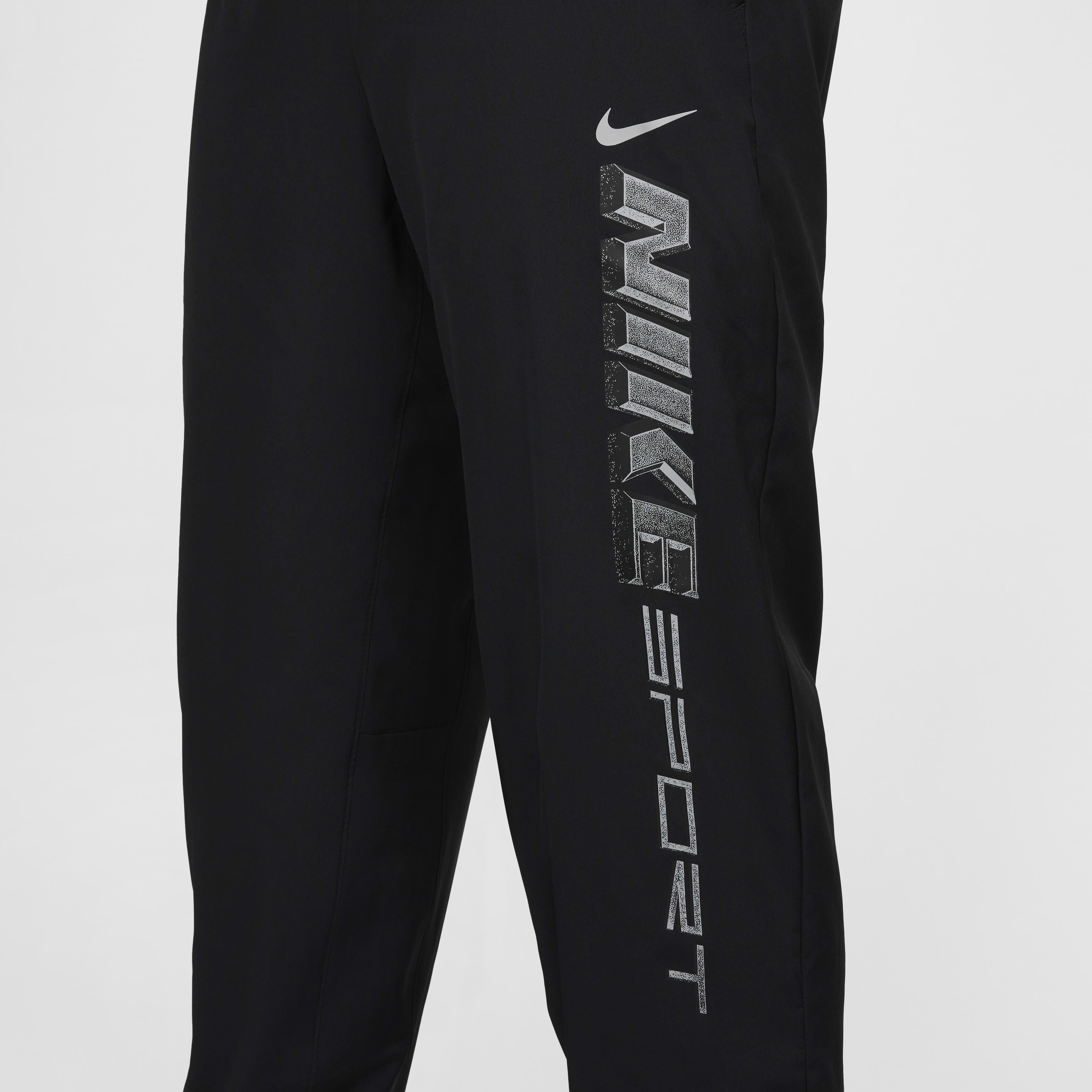 Buy Nike Form Men s Dri FIT Tapered Versatile Trousers Black Black Metallic Silver Nike Kuwait Official
