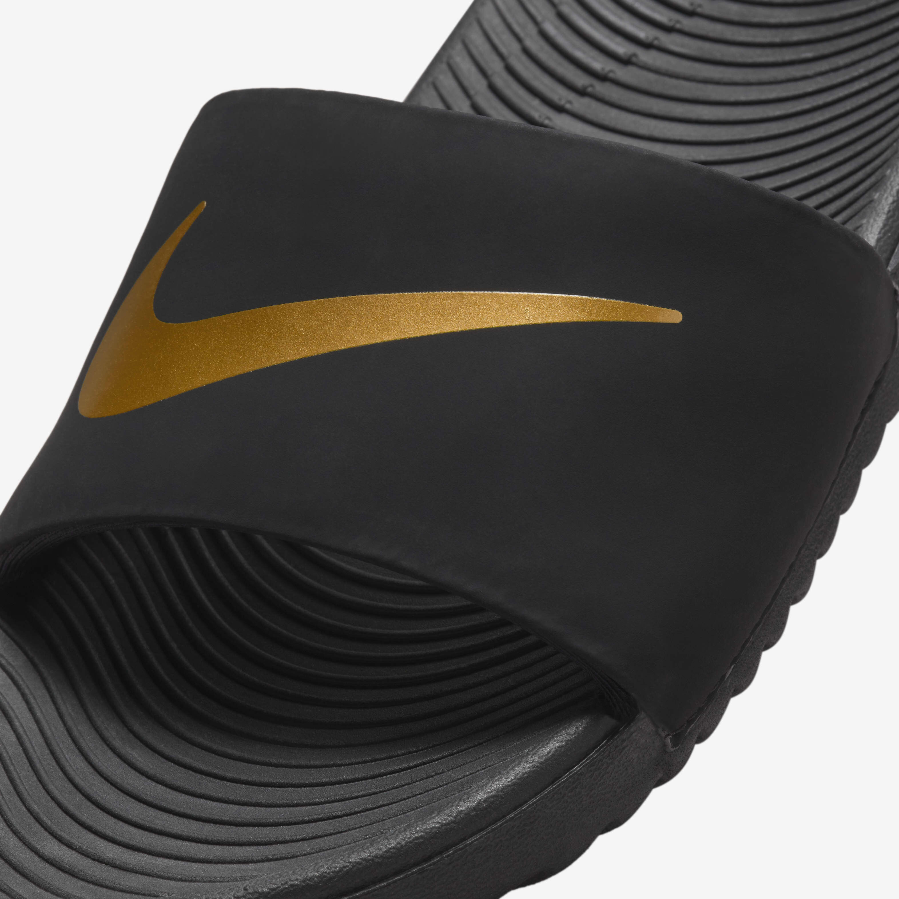 Buy Nike Kawa Younger Older Kids Slide Black Metallic Gold Nike Kuwait Official
