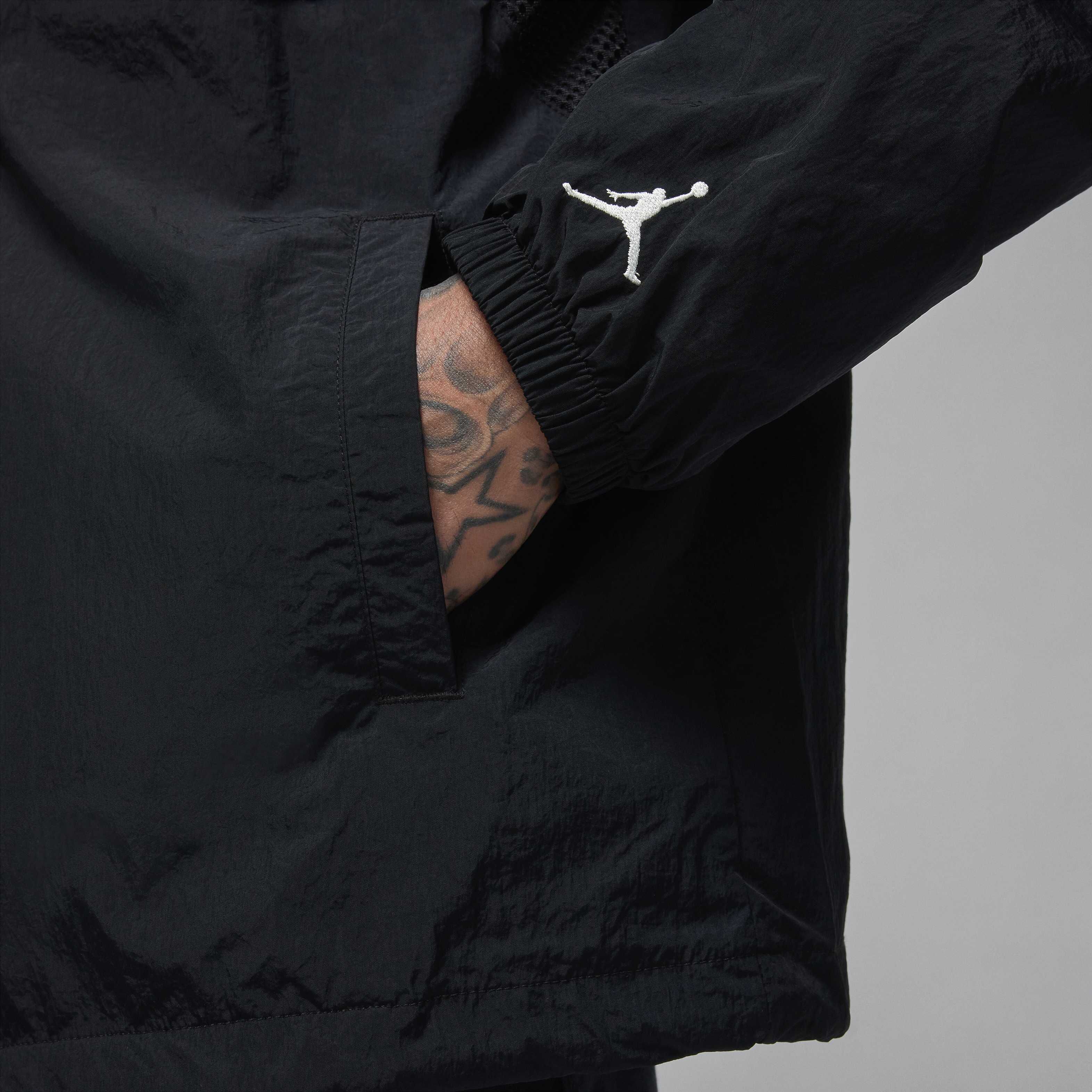 Buy Jordan Essentials Men s Coaches Jacket Black Sail Nike Kuwait Official