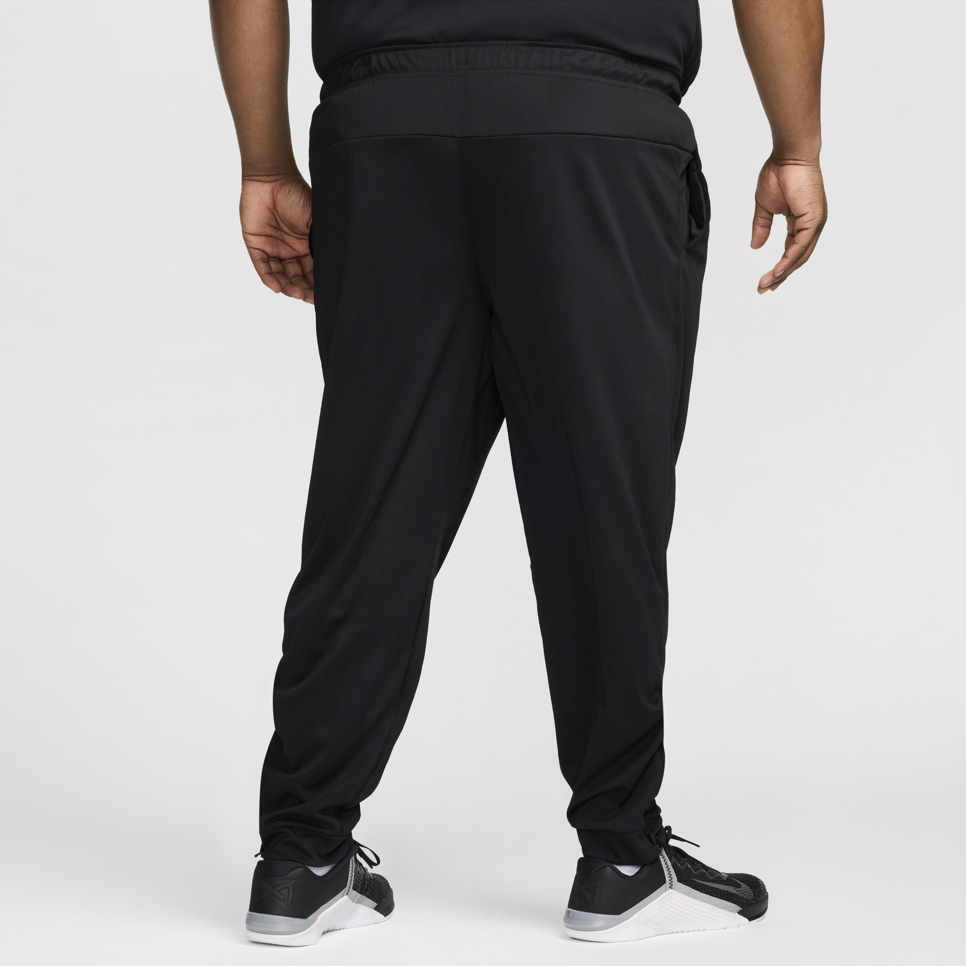 Nike tapered pants mens online