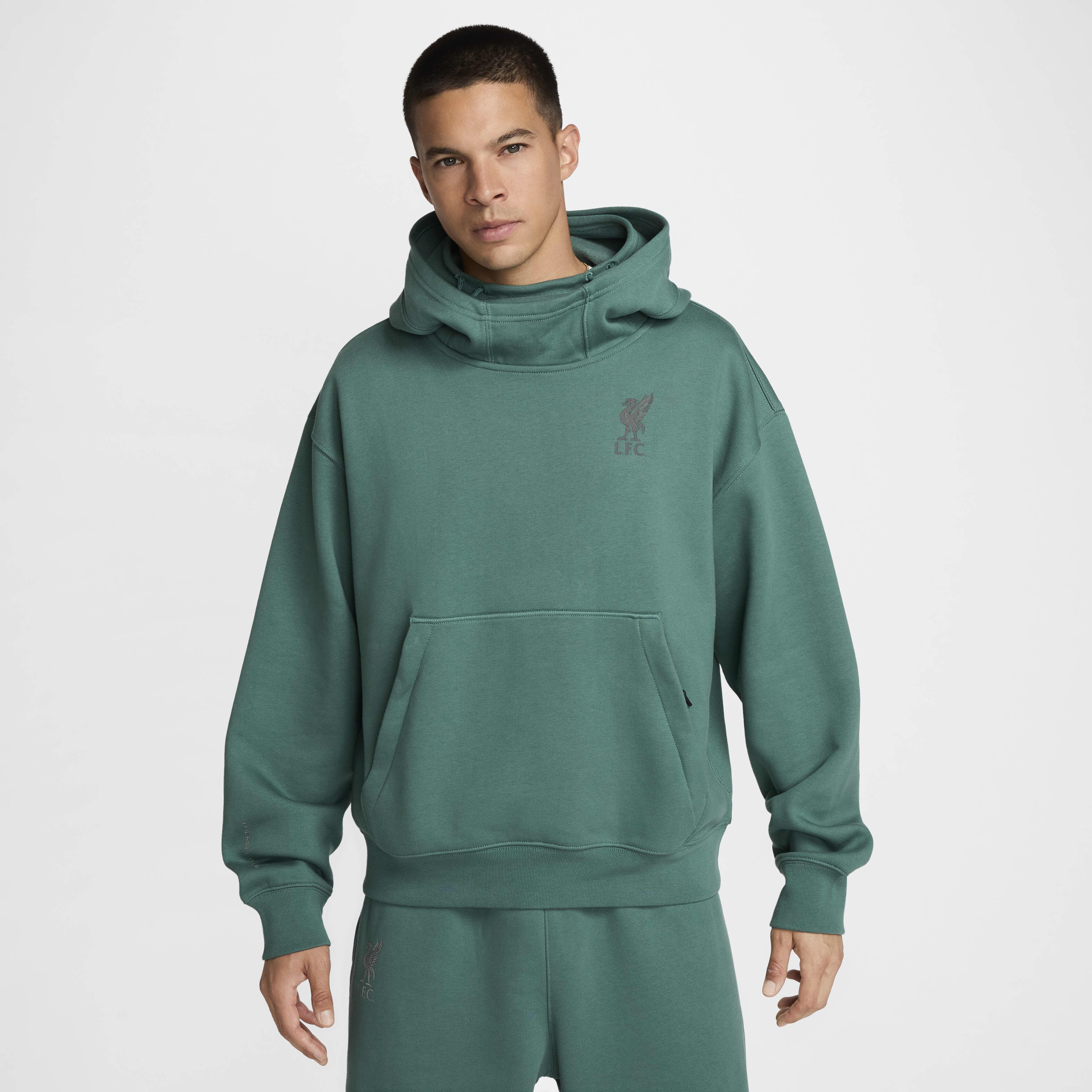 Buy Liverpool F.C. Tech Pack Men s Nike Therma FIT Winterized Top Bicoastal Metallic Silver Nike Kuwait Official