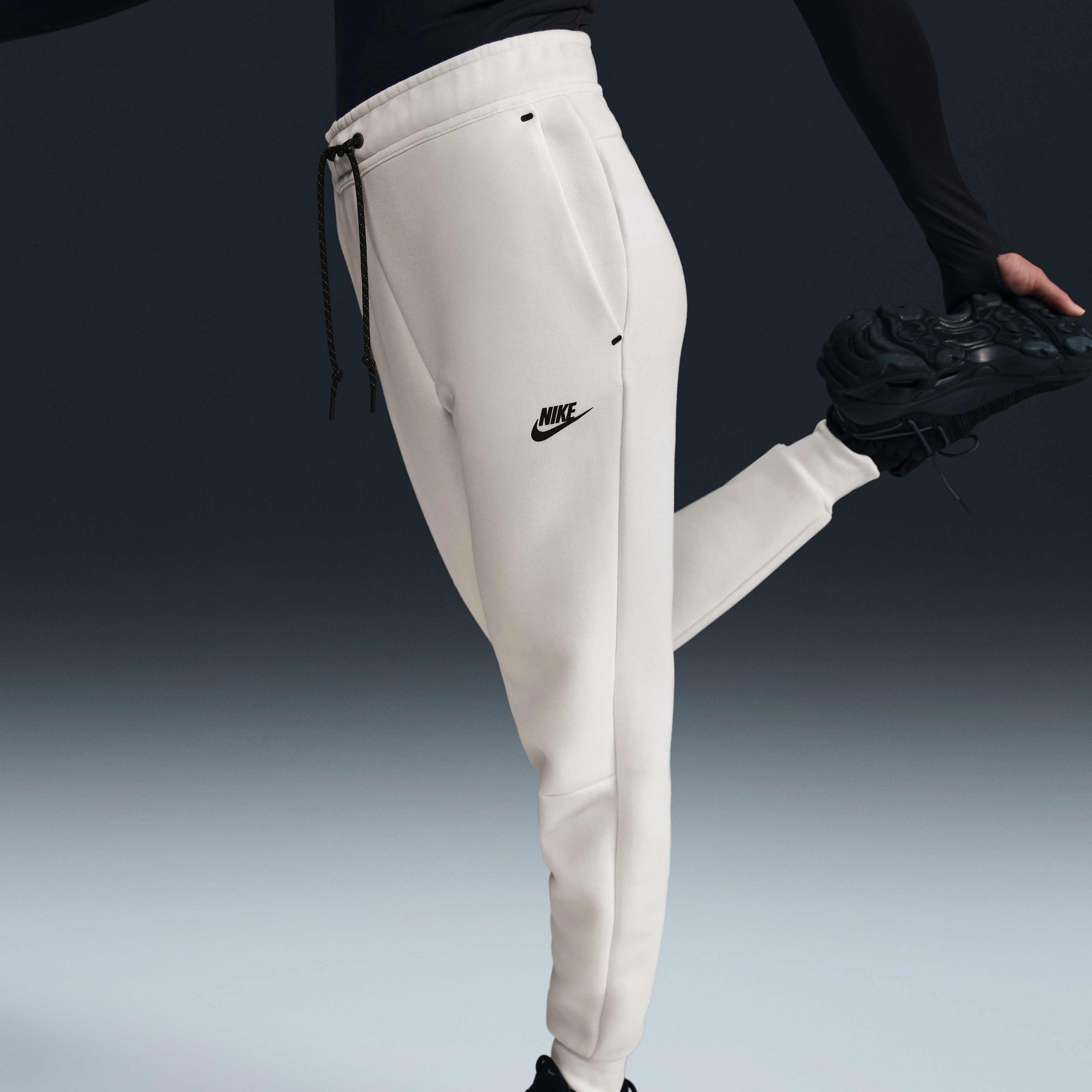 Buy Nike Sportswear Tech Fleece Women s Mid Rise Joggers Pale Ivory Black Nike Kuwait Official