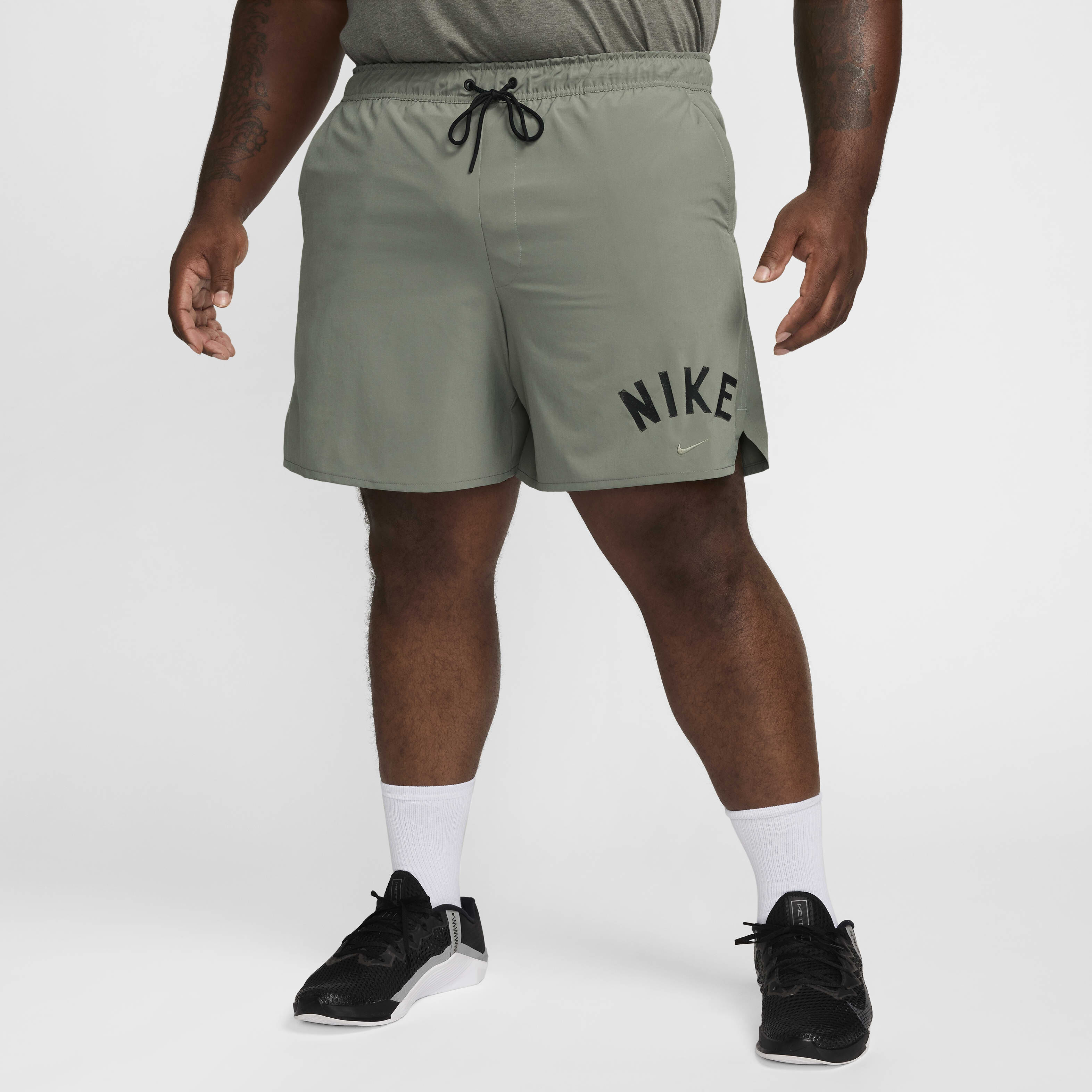 Buy Nike Unlimited Swoosh Men s 18cm approx. Dri FIT Unlined Versatile Shorts Nike Kuwait Official