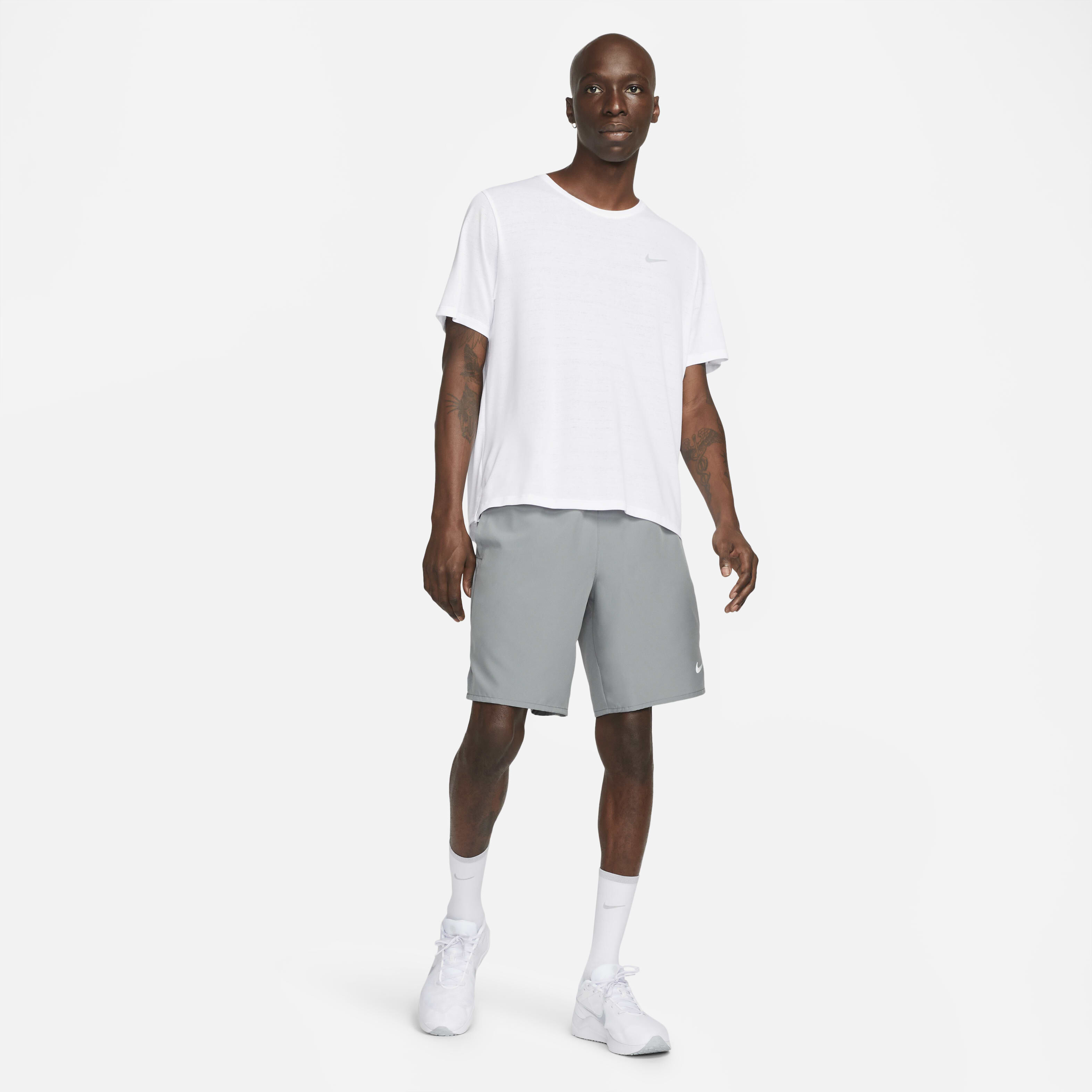 Buy Nike Challenger Men s Dri FIT 23cm approx. Unlined Versatile Shorts Smoke Grey Smoke Grey Black Nike Kuwait Official