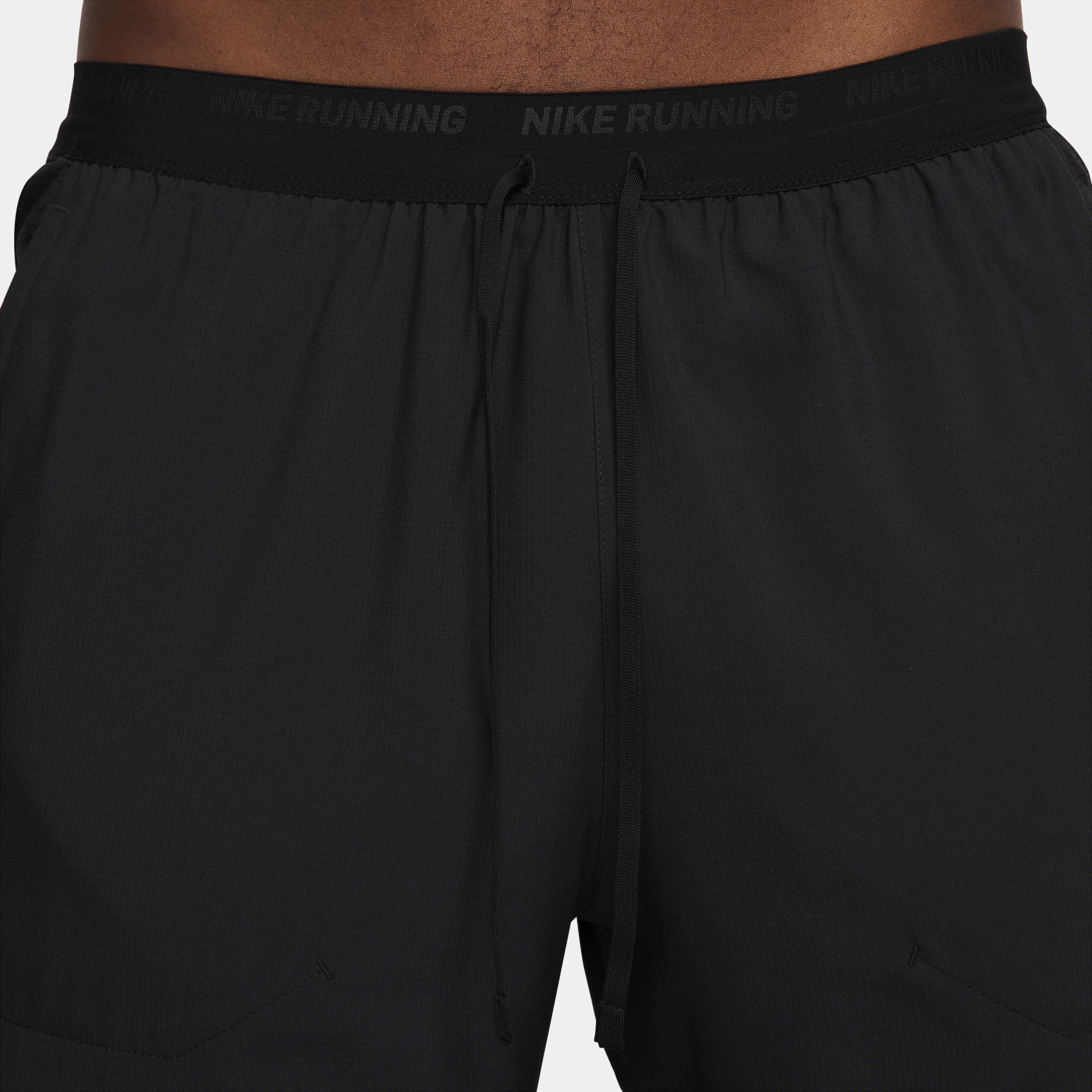 Buy Nike Stride Men s Dri FIT 18cm approx. 2 in 1 Running Shorts Nike Kuwait Official