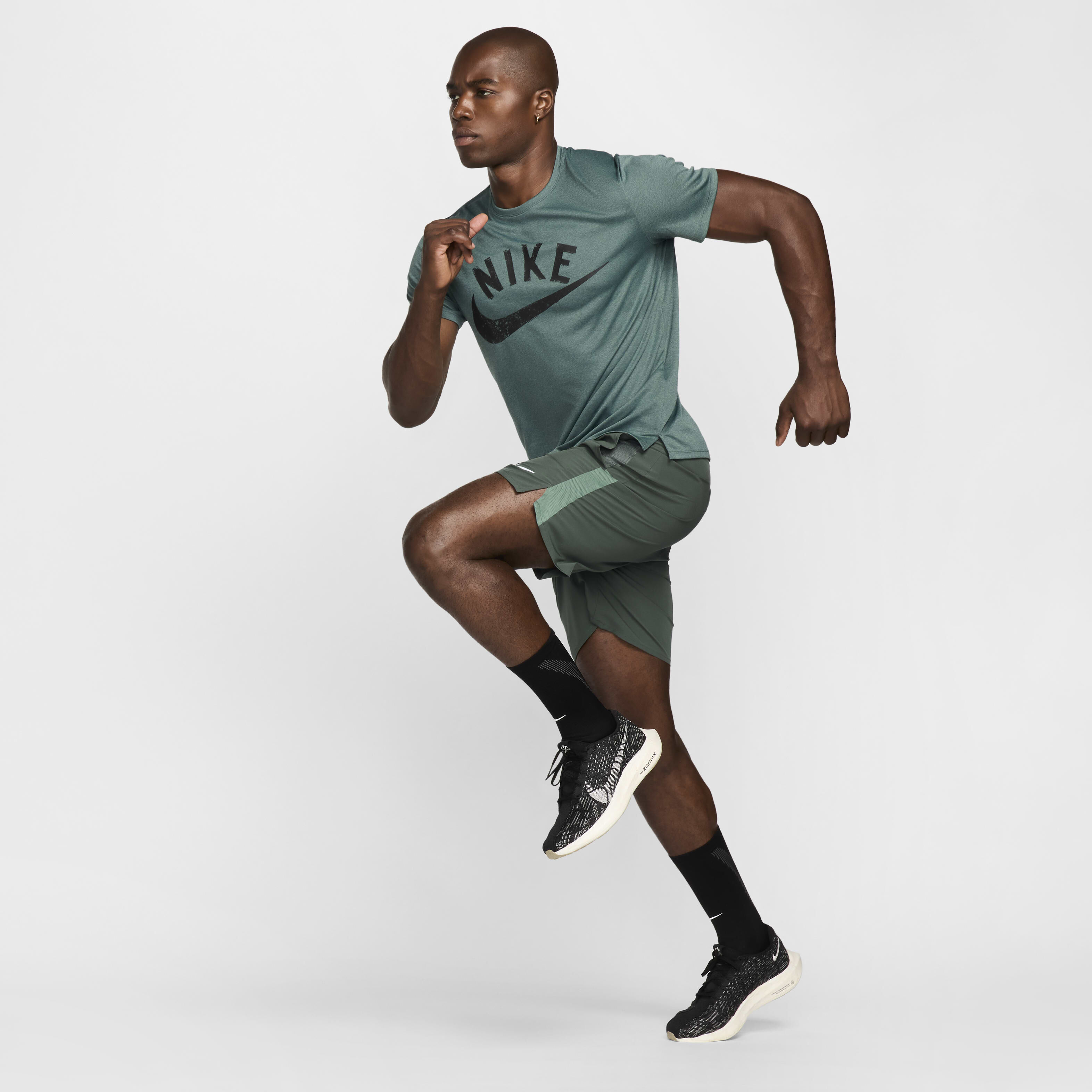 Buy Nike Miler Men s Dri FIT Short Sleeve Running Top Nike Kuwait Official