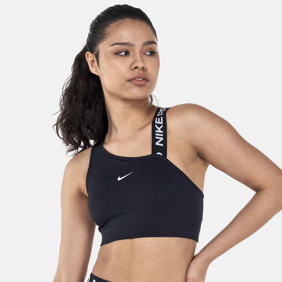 Women s Pro Dri FIT Swoosh Asymmetric Sports Bra