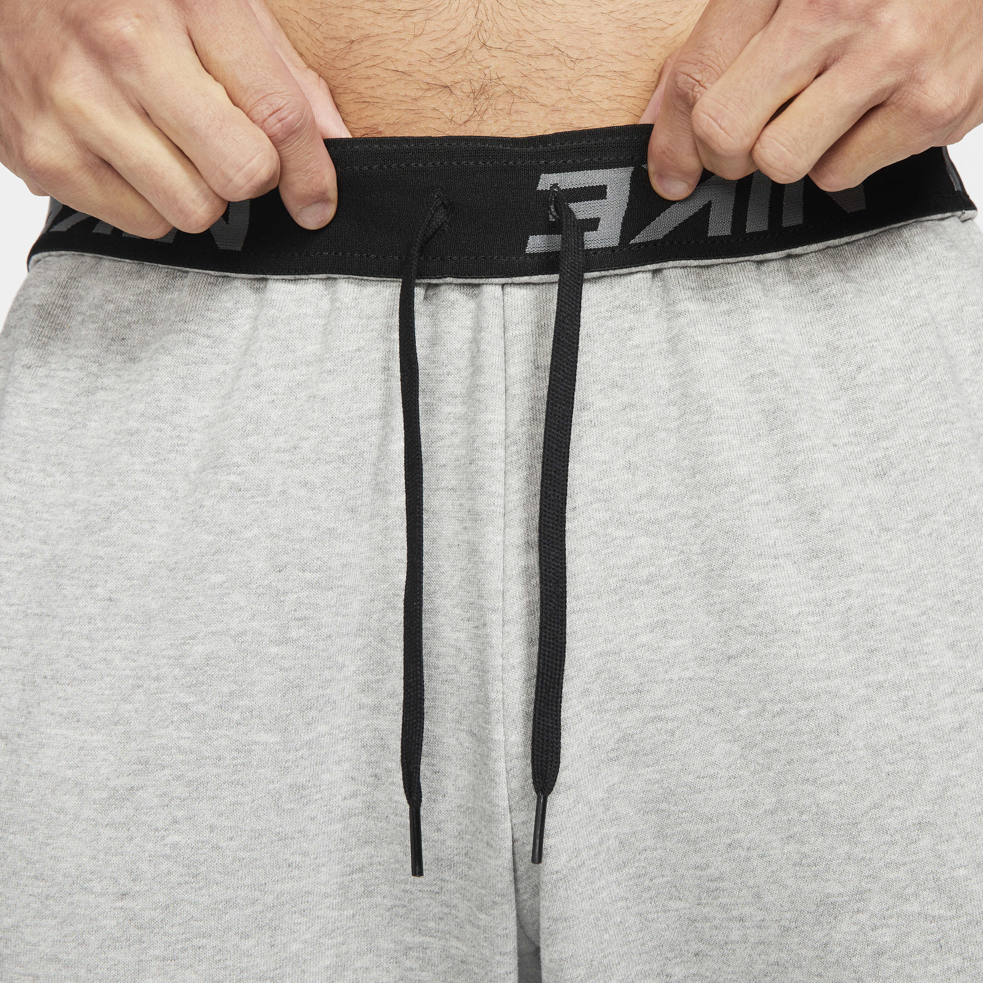 Buy Nike Dry Men s Dri FIT Taper Fitness Fleece Trousers Nike Kuwait Official