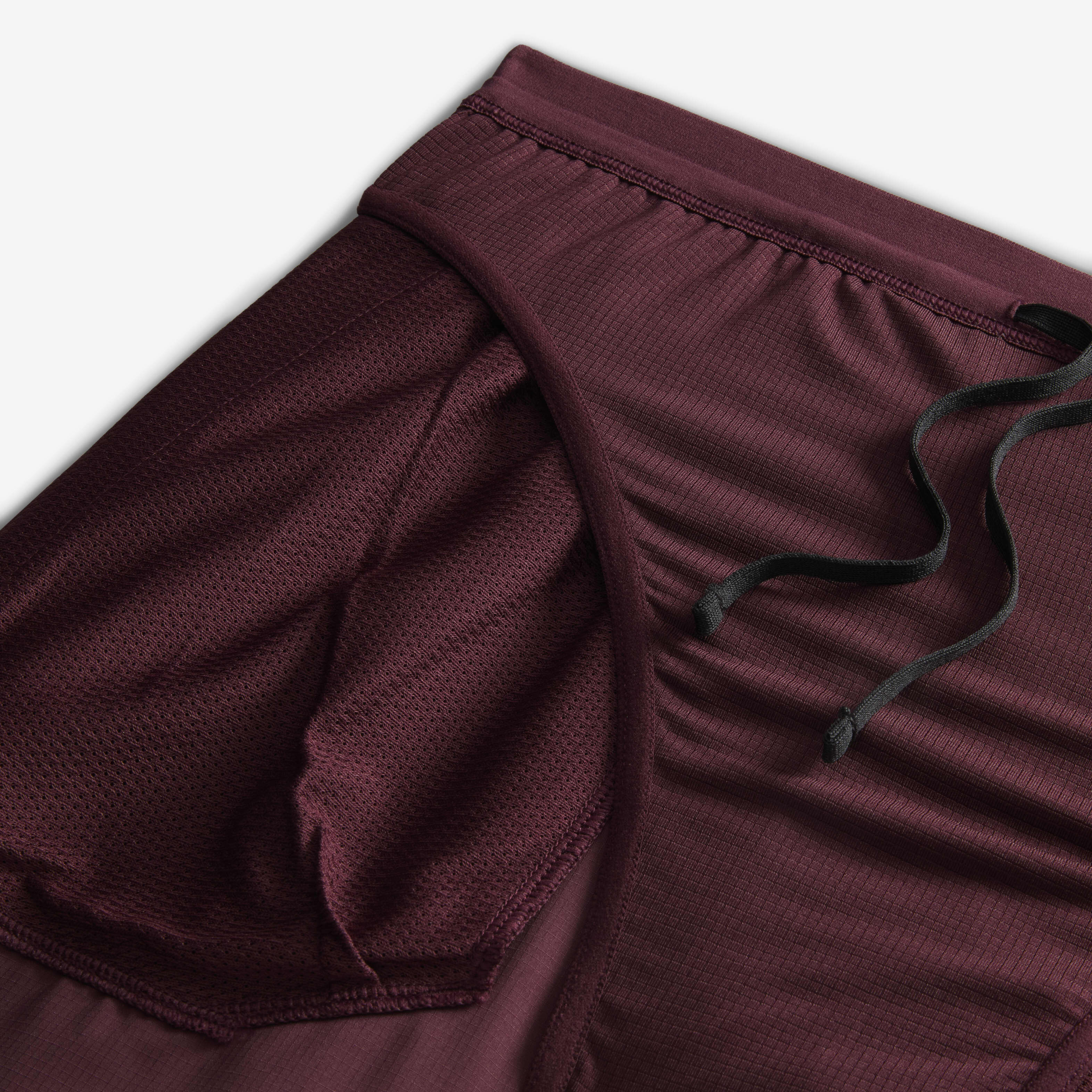 Buy Nike Stride Men s Dri FIT 13cm approx. Brief Lined Running Shorts Burgundy Crush Black Nike Kuwait Official