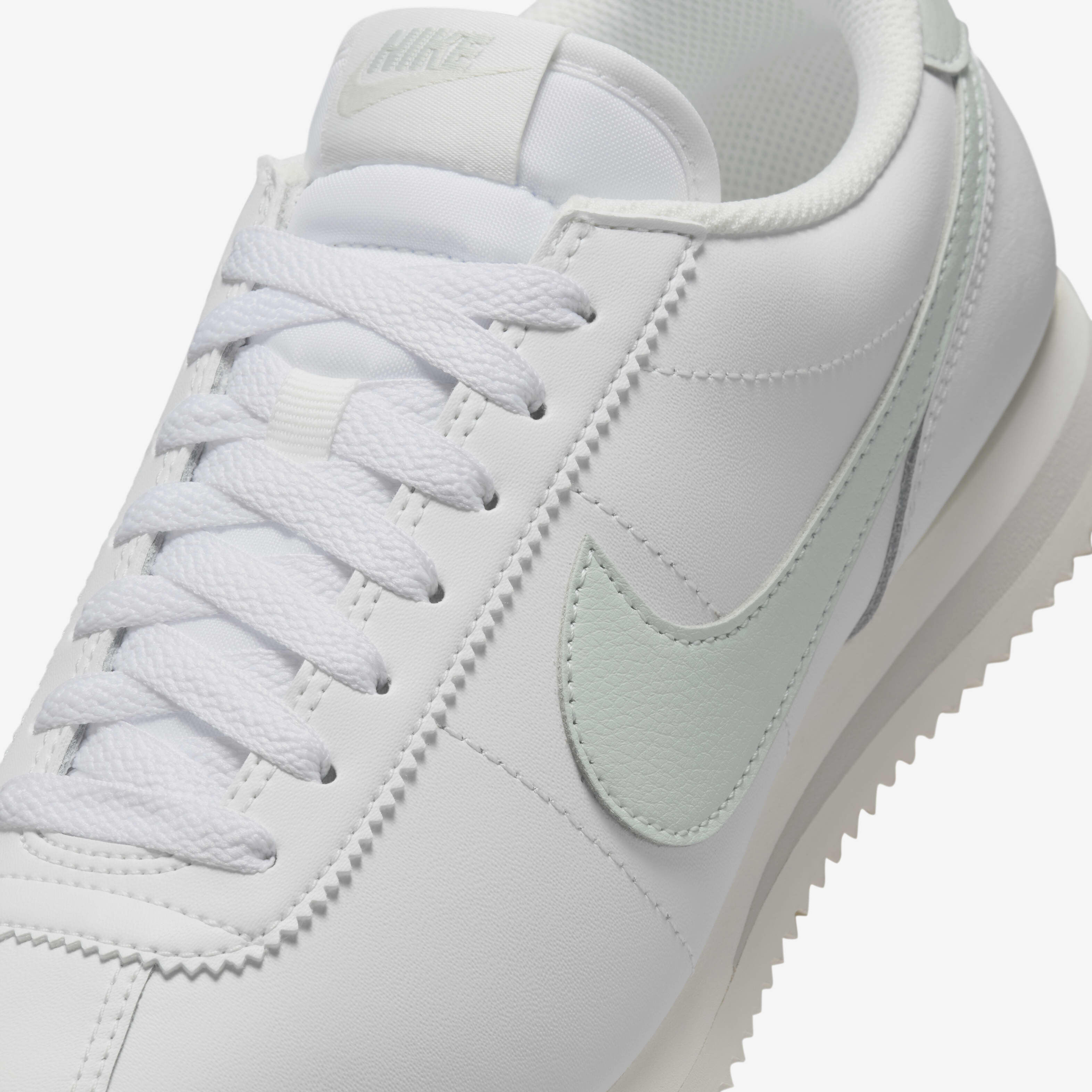 Silver cortez nike hot sale