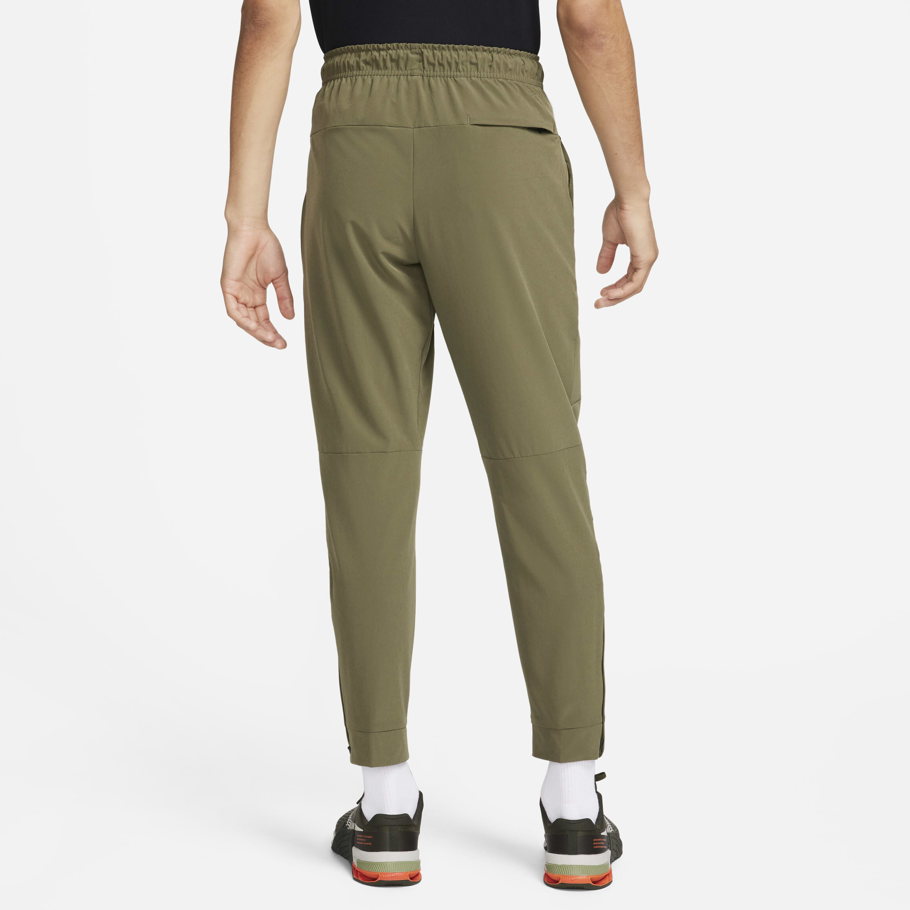 Buy Nike Unlimited Men s Dri FIT Zip Cuff Versatile Trousers Nike Kuwait Official
