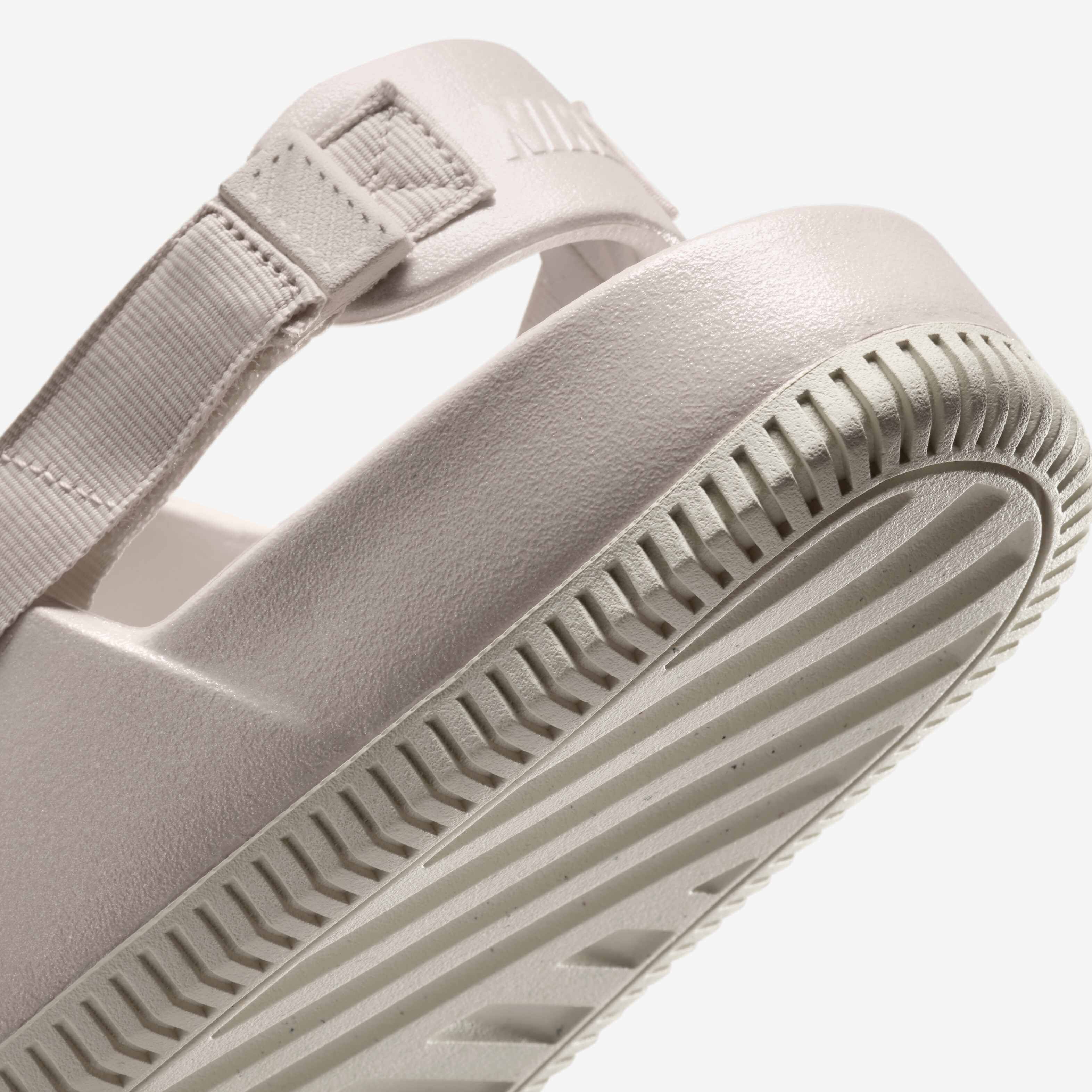 ◆Nike◆ Calm Pearlized Women's Mule HQ7020-100 Buy Nike Calm Pearlised Women's Mules - Light Orewood Brown