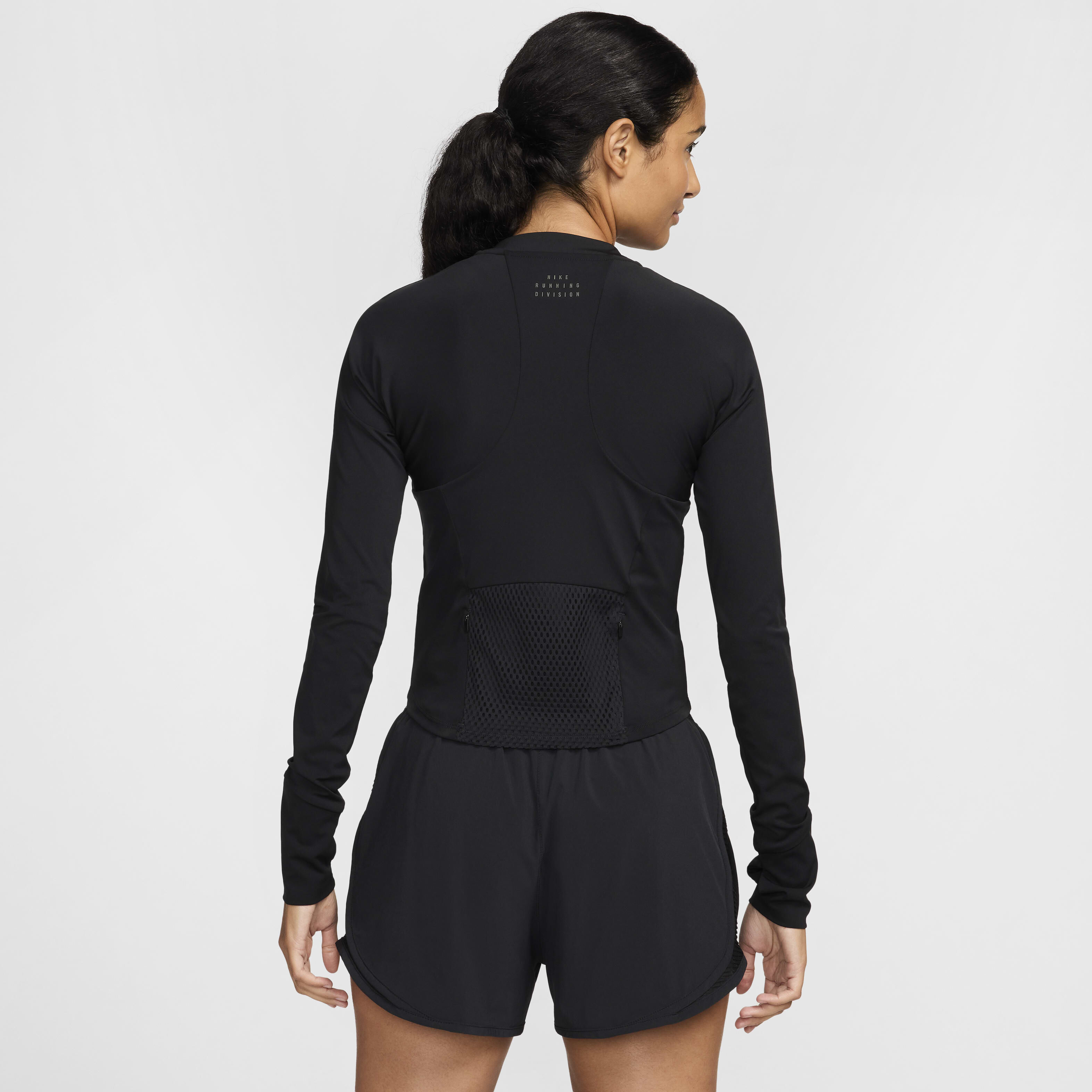 Buy Nike Running Division Women s Dri FIT Long Sleeve Pocket Running Top Nike Kuwait Official